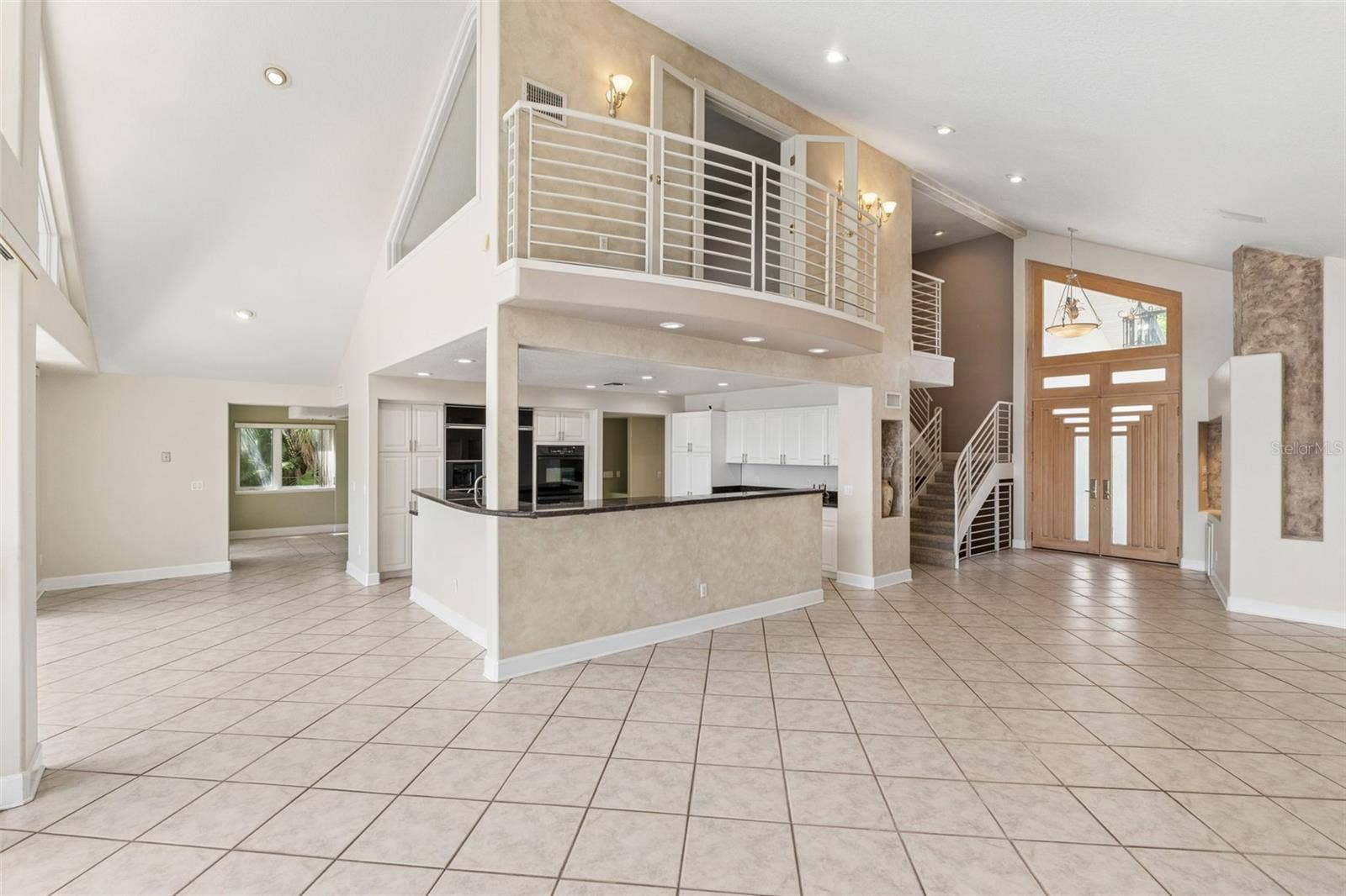 4301 DOWN POINT LANE, Windermere, FL 34786 Living Room overlooking the kitchen, and Office above the kitchen.
