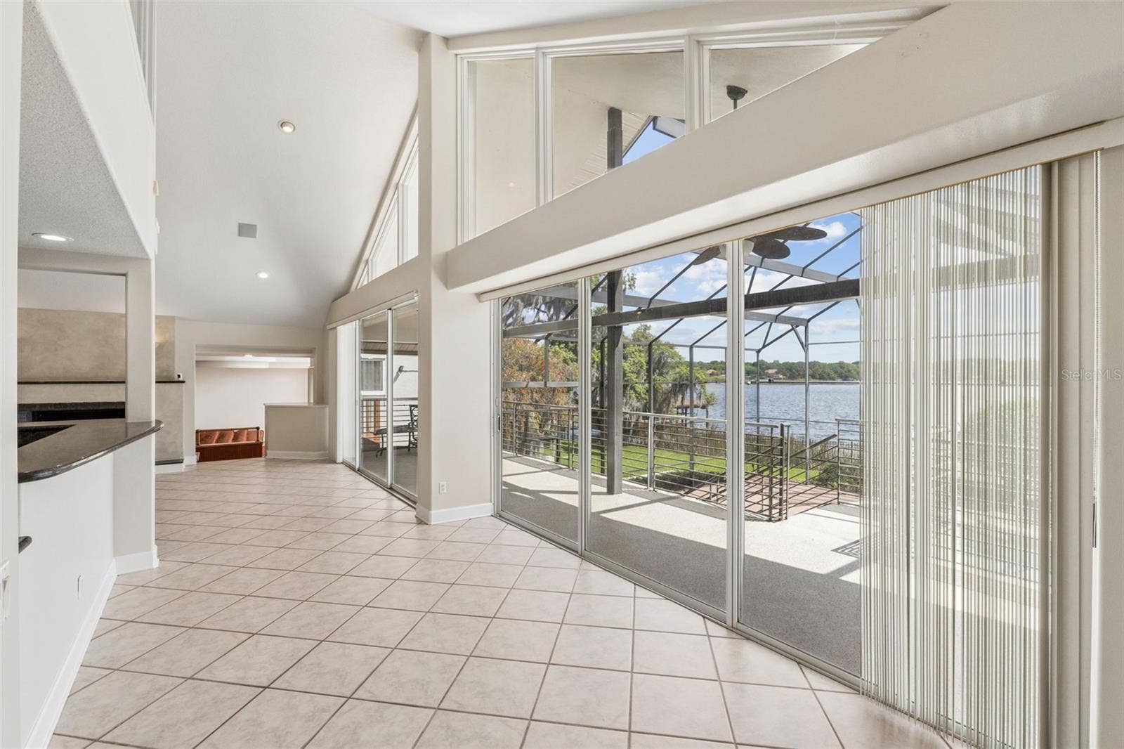 4301 DOWN POINT LANE, Windermere, FL 34786 Open walkway connecting the dining