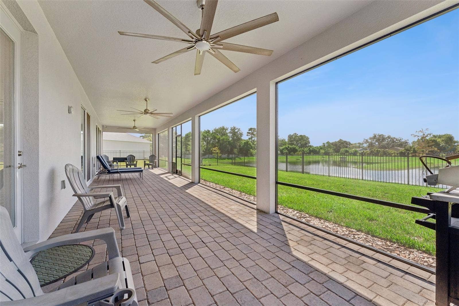 2612 RAVENCLIFFE TERRACE, Oviedo, FL 32765 Downstairs Screened in Patio