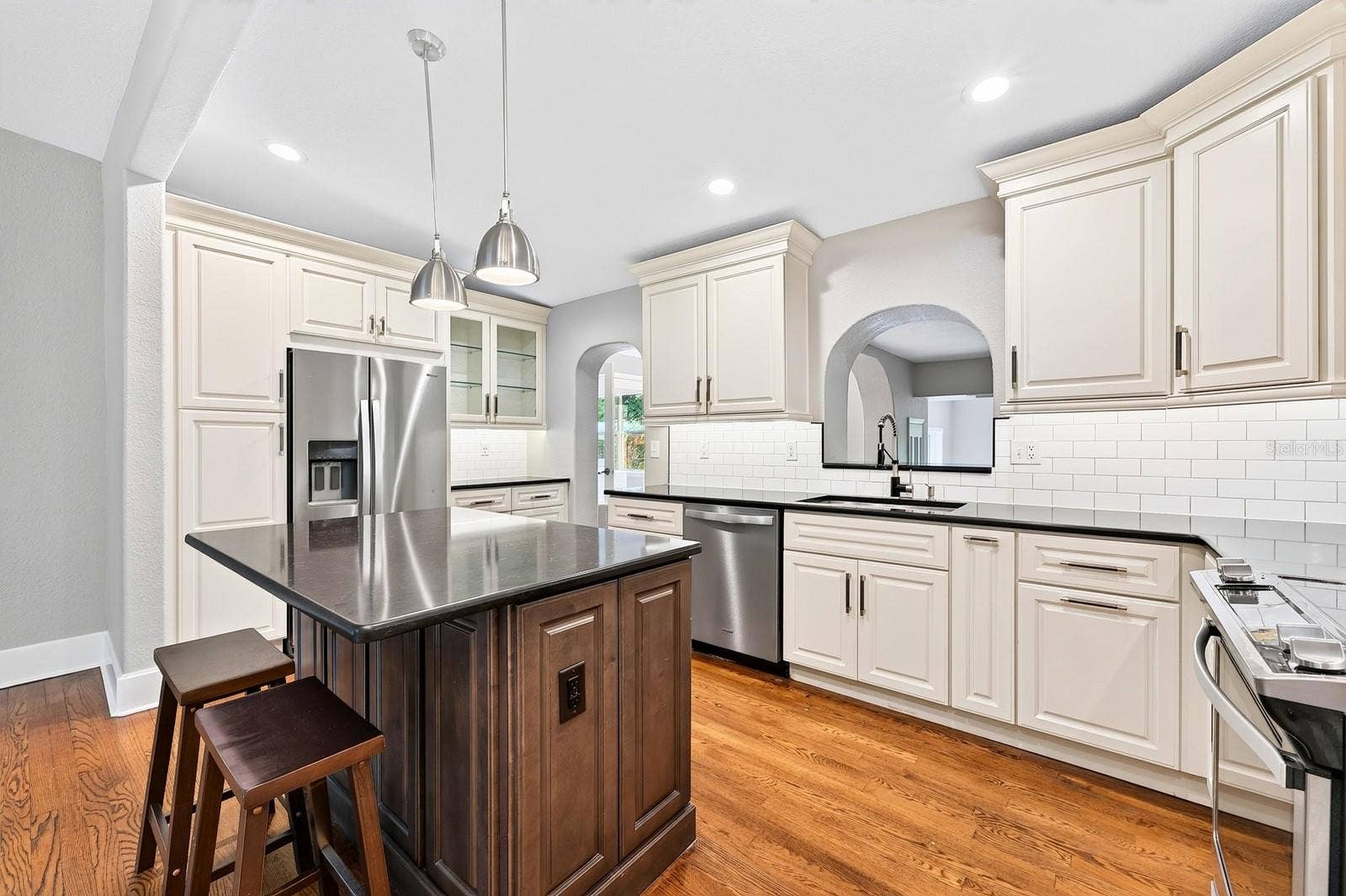The remodeled kitchen offers updated finishes, ample storage and thoughtful details!