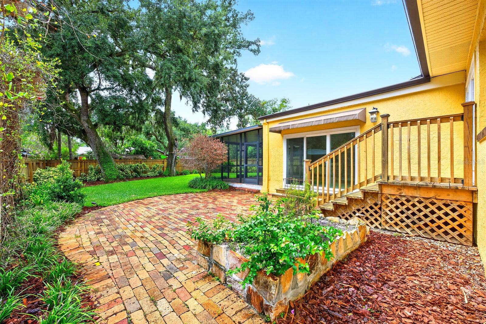 Outside of the screened lanai there is also a paver patio.