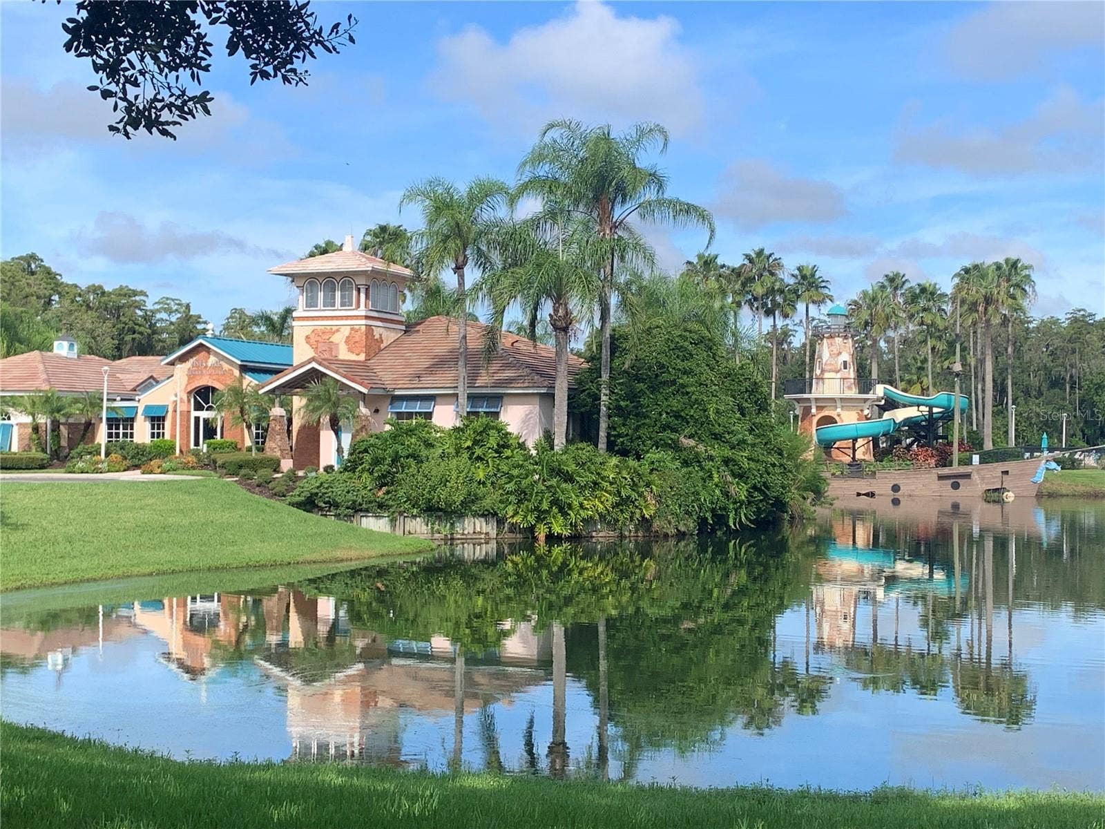6738 VISTA PARK BOULEVARD, Orlando, FL 32829 CLUBHOUSE. LAKE. WATERSLIDE.