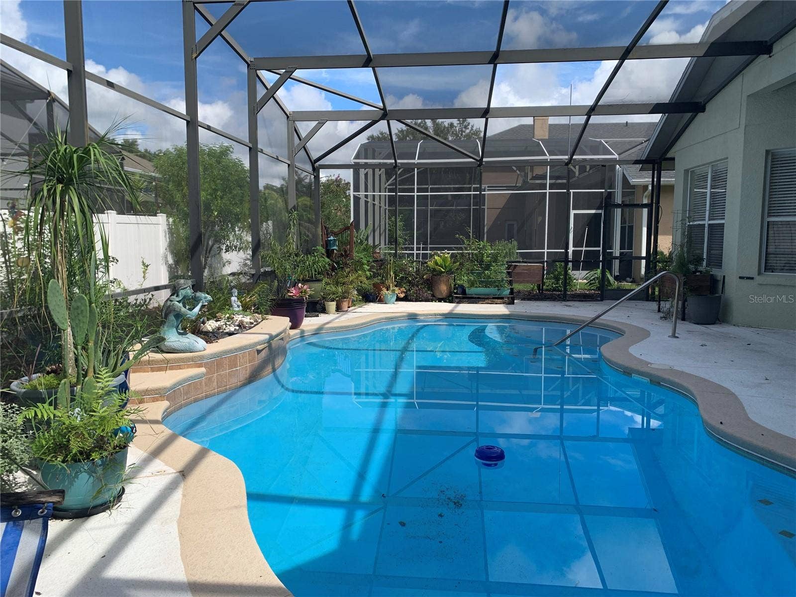 6738 VISTA PARK BOULEVARD, Orlando, FL 32829 SCREENED AND SOLAR HEATED POOL