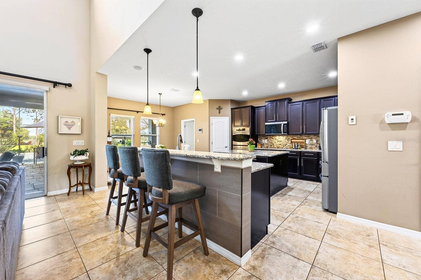 The kitchen truly is the heart of this beautiful home, gather with family or entertain friends.