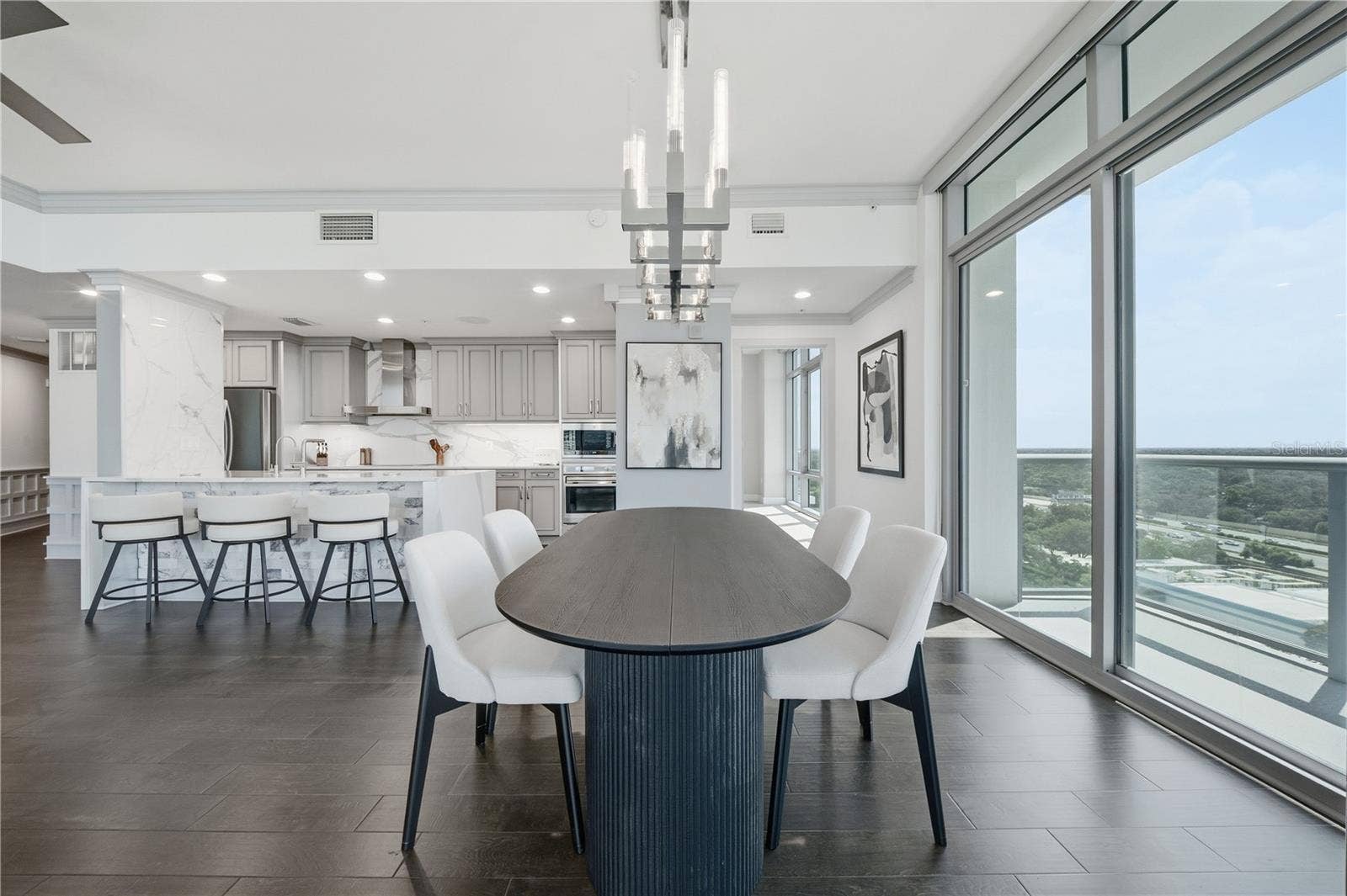 260 S OSCEOLA AVENUE, #1406, Orlando, FL 32801 Open Living | Kitchen, dining and living connect across the 2,000-SQ-FT corner floor plan