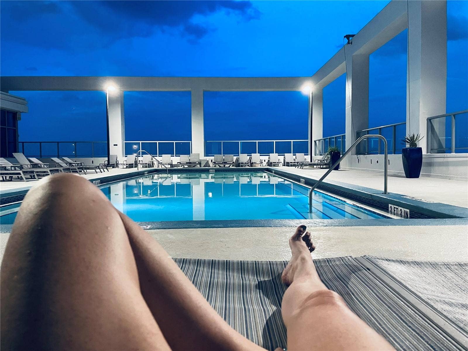 260 S OSCEOLA AVENUE, #1406, Orlando, FL 32801 ROOFTOP POOL AT NIGHT.