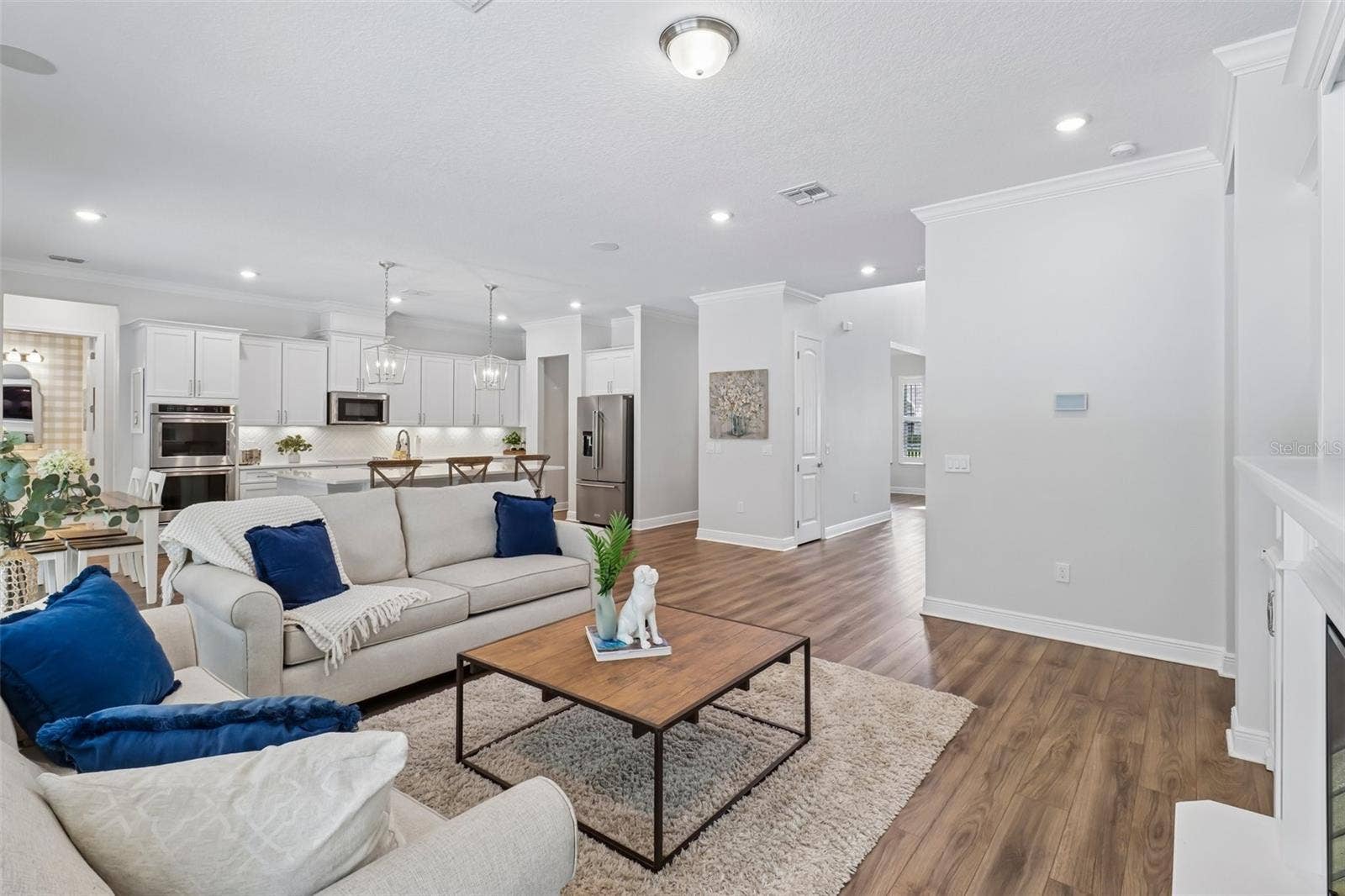1257 WADING WATERS CIRCLE, Winter Park, FL 32792 Open & bright living room, open to the kitchen, perfect for entertaining!