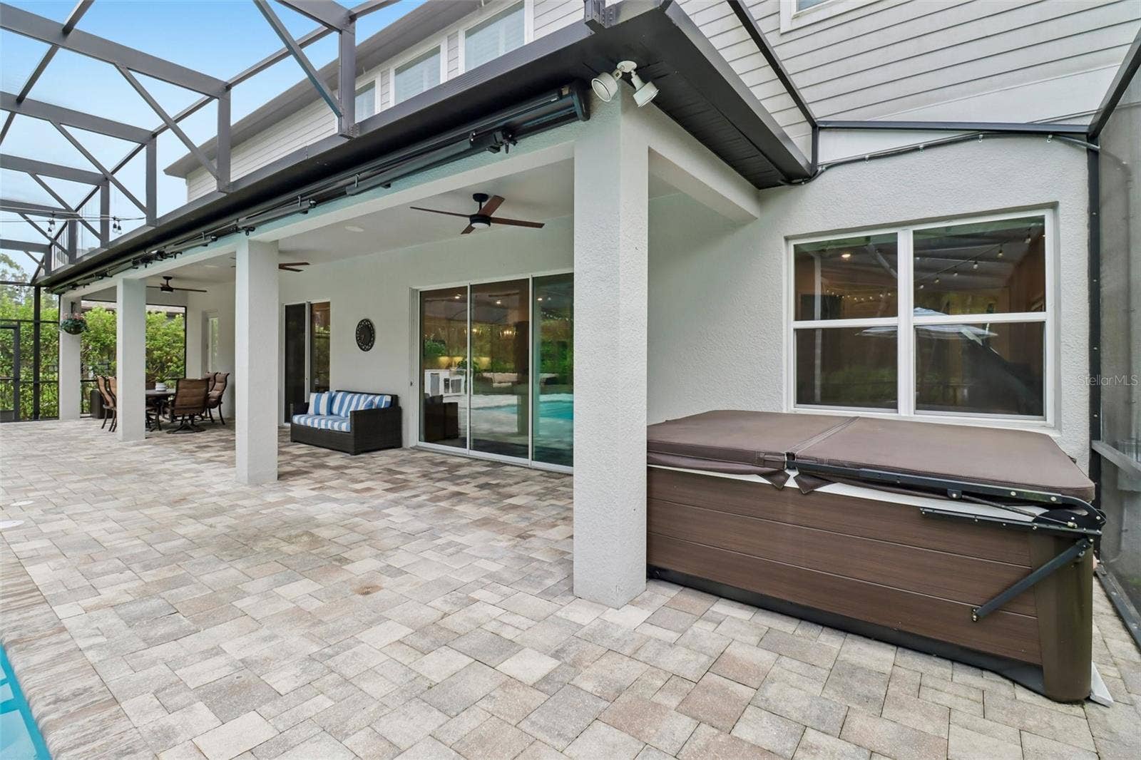 1257 WADING WATERS CIRCLE, Winter Park, FL 32792 There is a retractable awning off of the lanai roof for more shade