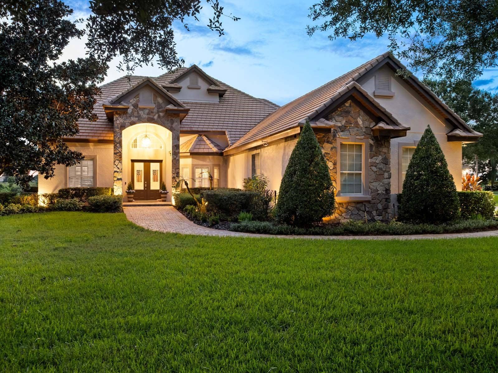 12721 JACOB GRACE COURT, Windermere, FL 34786 Twilight Front Exterior