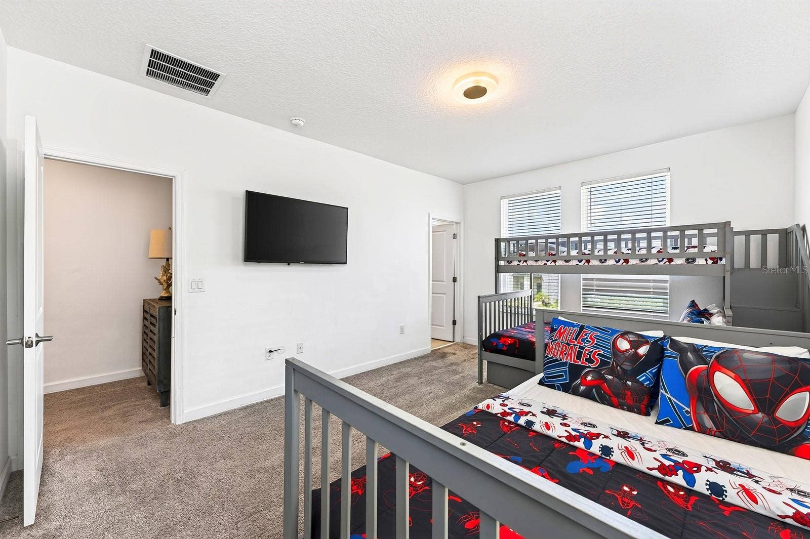 1045 LEADER STREET, Davenport, FL 33896 Bedroom 6 (Bonus Room) has its own EN-SUITE BATH, giving guests plenty of comfort and privacy.