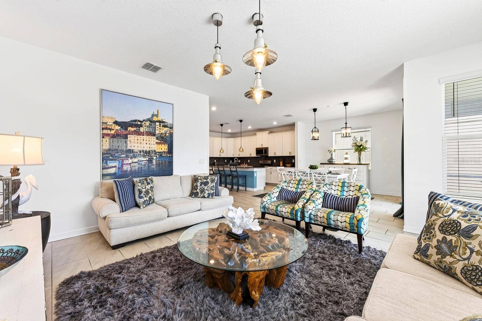 1045 LEADER STREET, Davenport, FL 33896 The expansive Living Room invites connection and comfort.