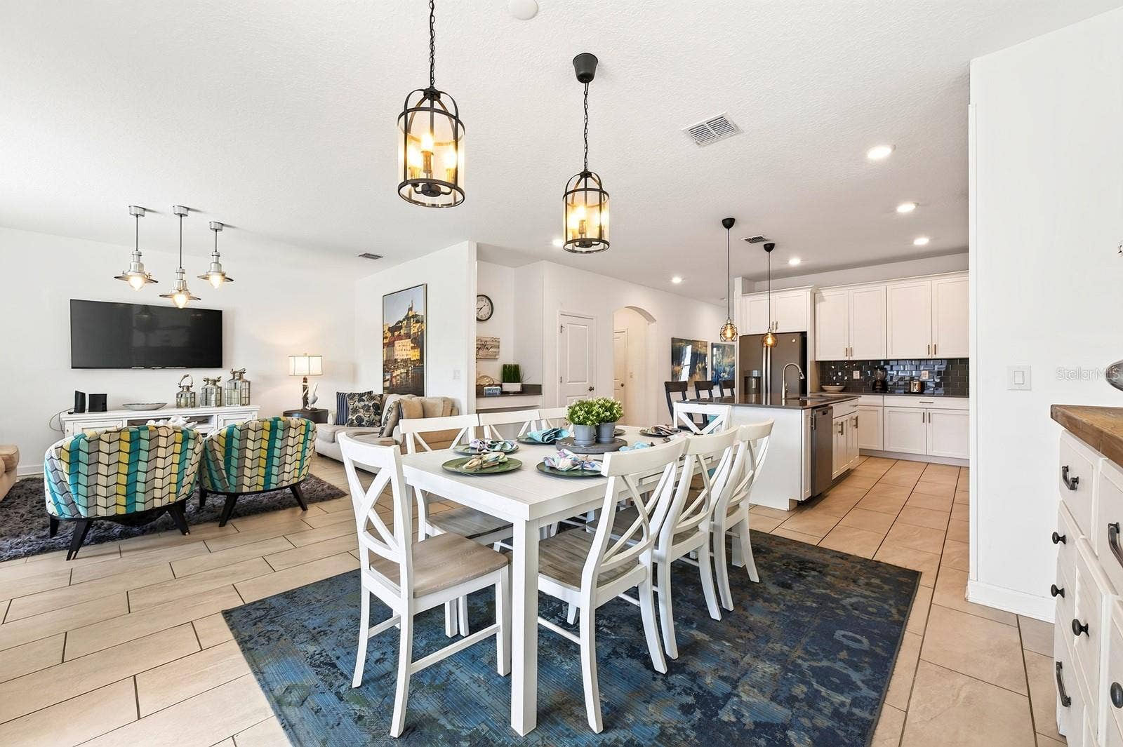 1045 LEADER STREET, Davenport, FL 33896 The adjacent Dining Area keeps everyone connected.