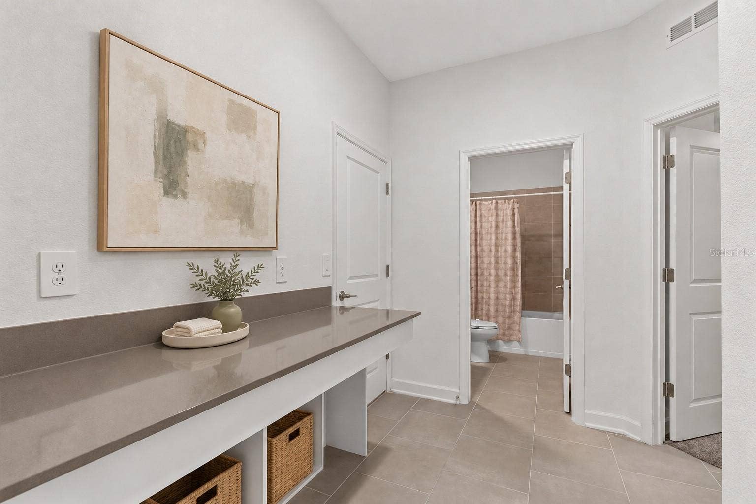 1874 FLOURISH AVENUE, Kissimmee, FL 34744 A built in desk and drop zone near the garage provide a dedicated place for homework, organization or working from home.