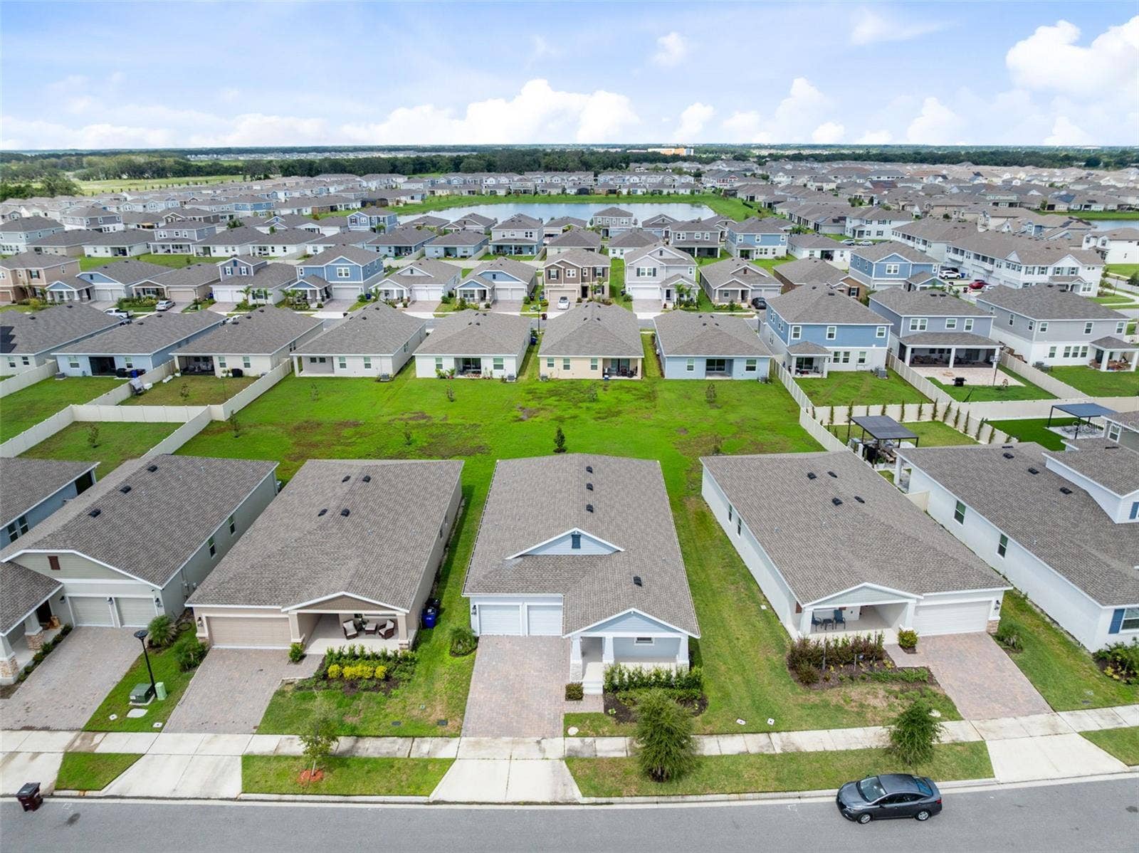 1874 FLOURISH AVENUE, Kissimmee, FL 34744 Built in 2024 and thoughtfully designed for the way you live, this spacious 4 bedroom, 3 bath home brings together modern finishes, flexible living spaces and a private three way split floor plan in the sought after Tohoqua community!