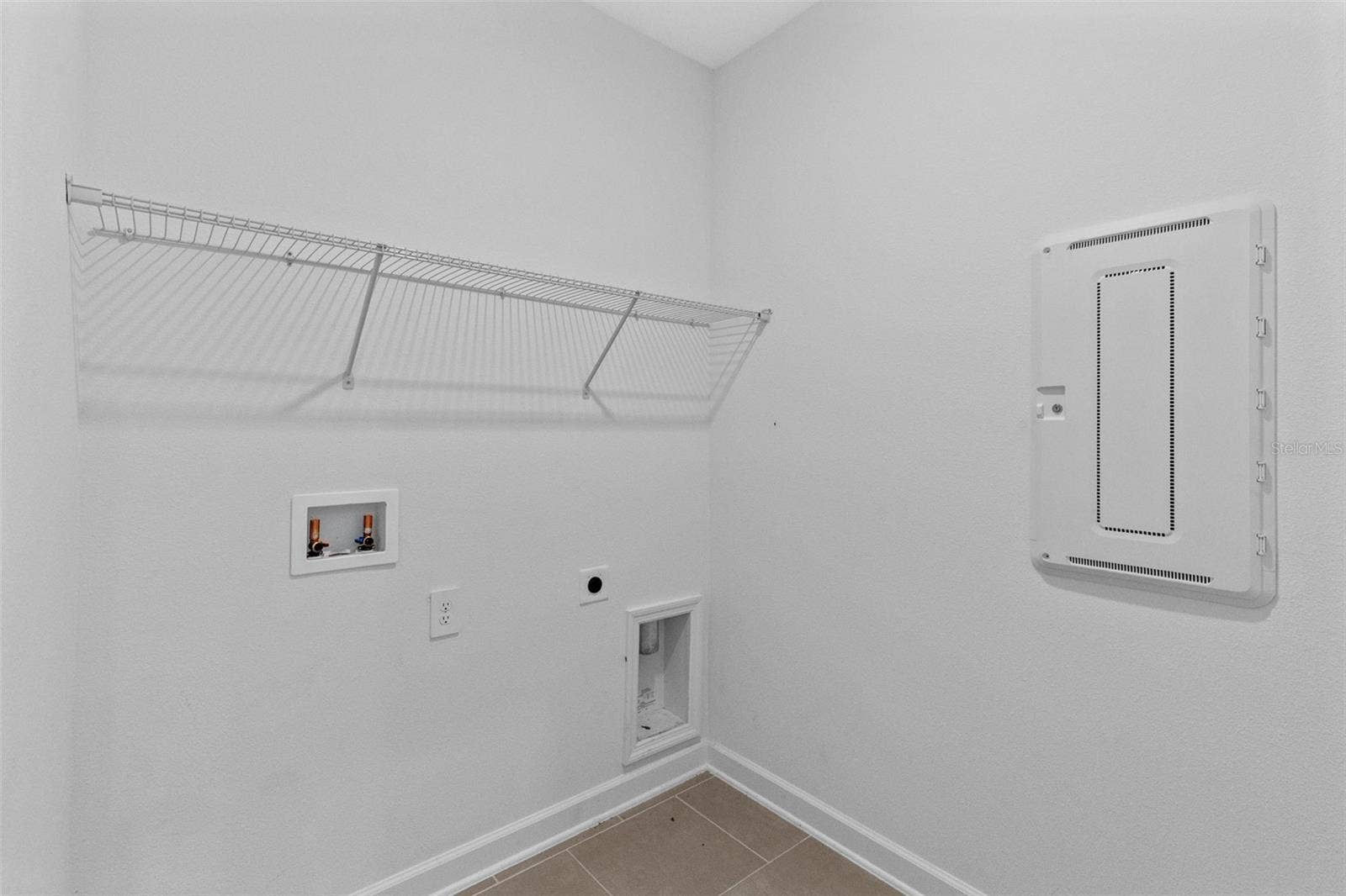 1874 FLOURISH AVENUE, Kissimmee, FL 34744 Laundry room.