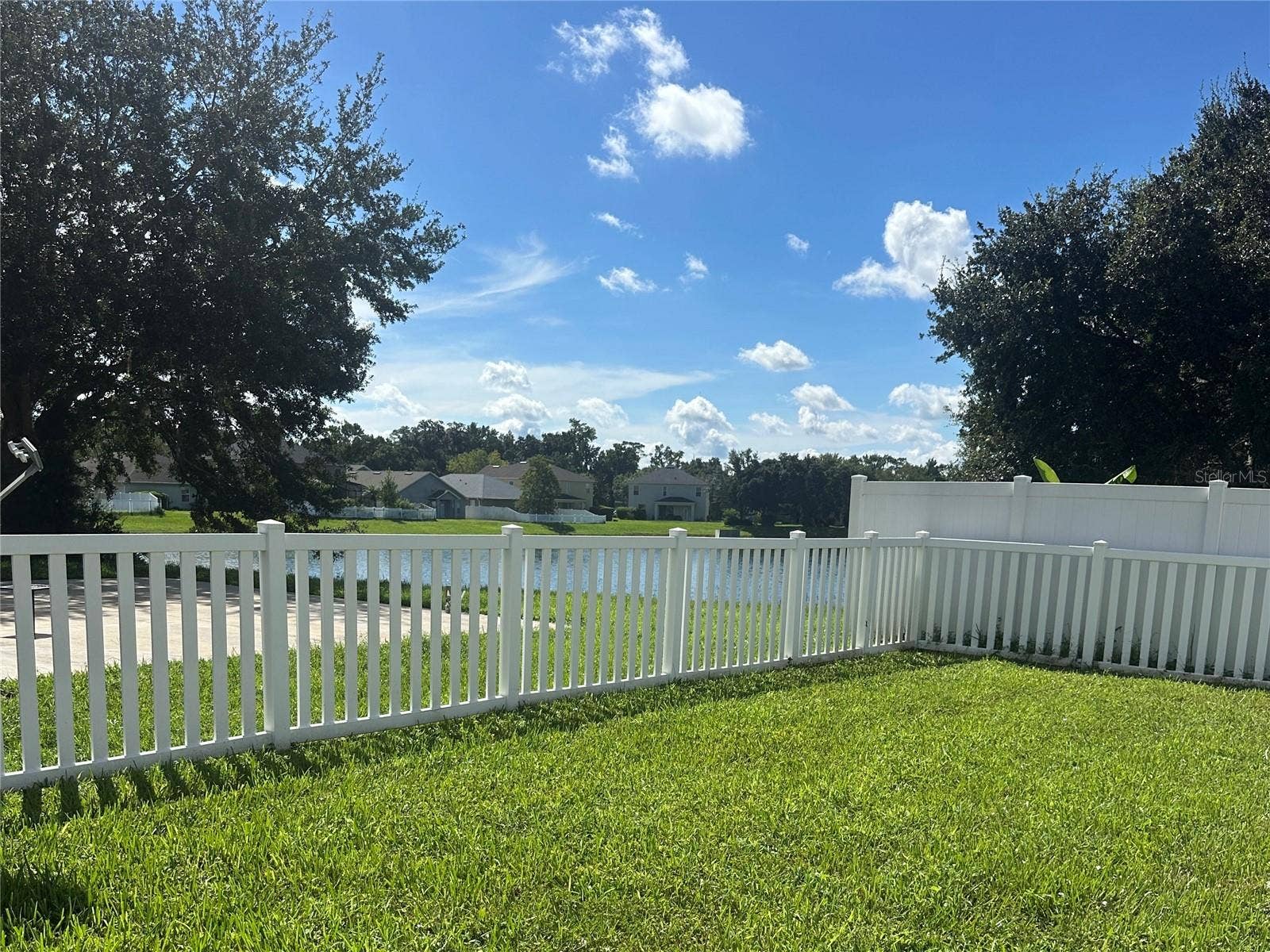 15245 STONEBRIAR WAY, Orlando, FL 32826 Partial View of Pond