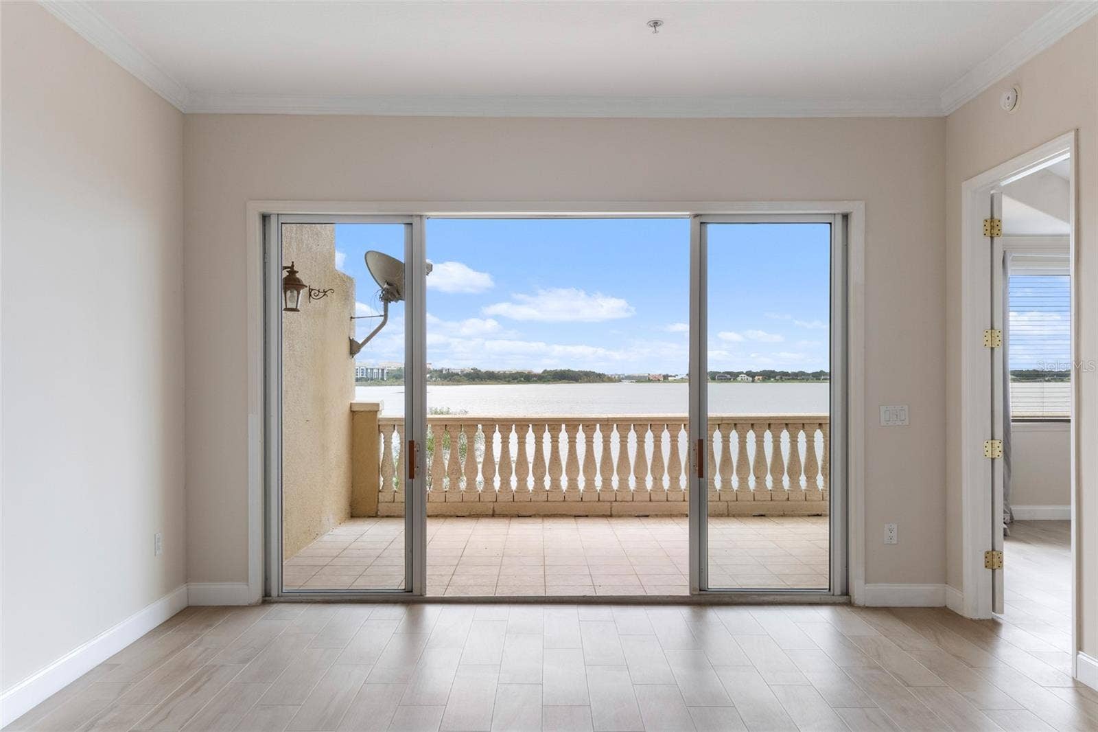 8749 THE ESPLANADE, #5, Orlando, FL 32836 Slider out to Balcony from Living Room