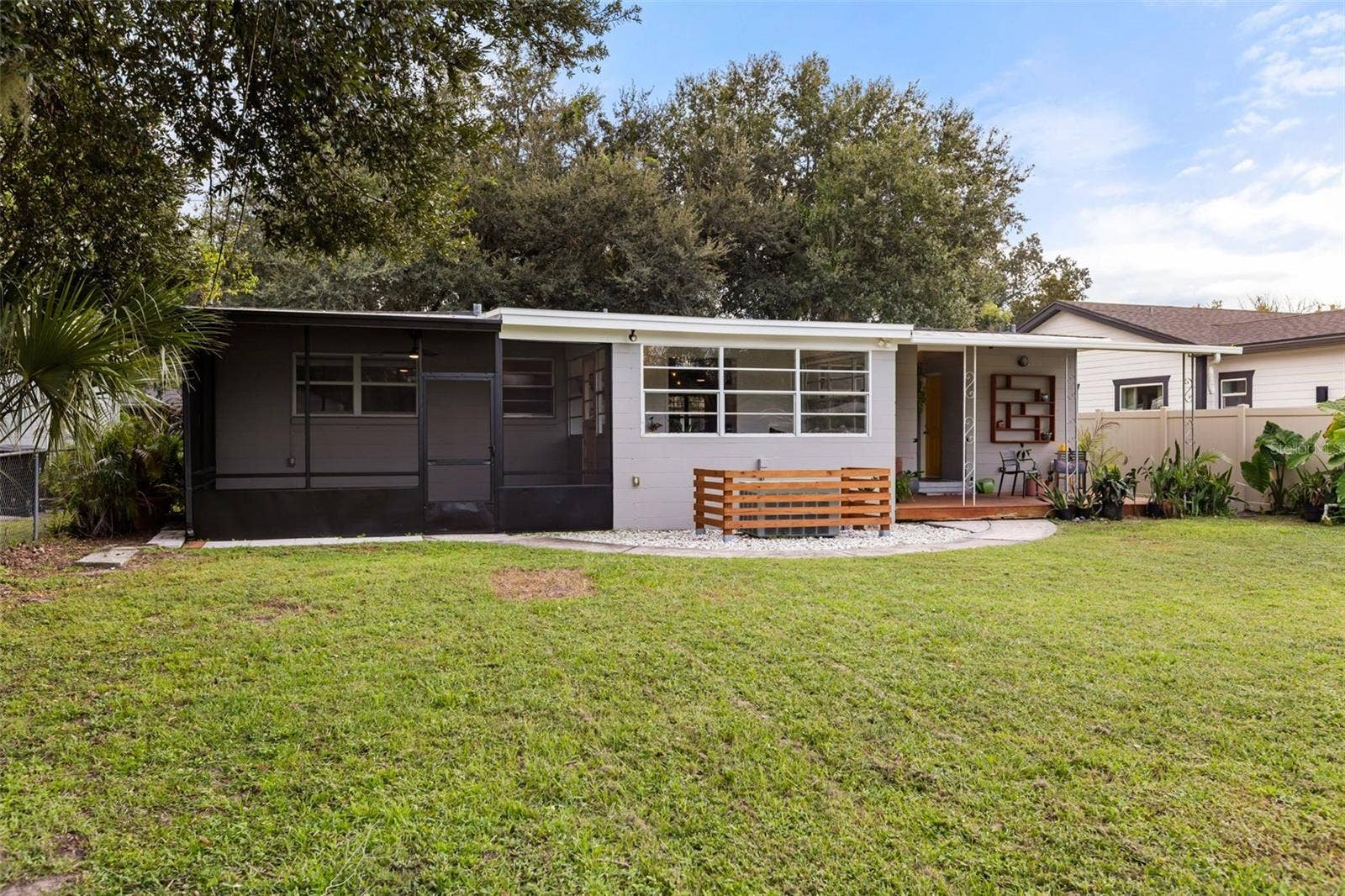 Features both screened in and open air covered patio space