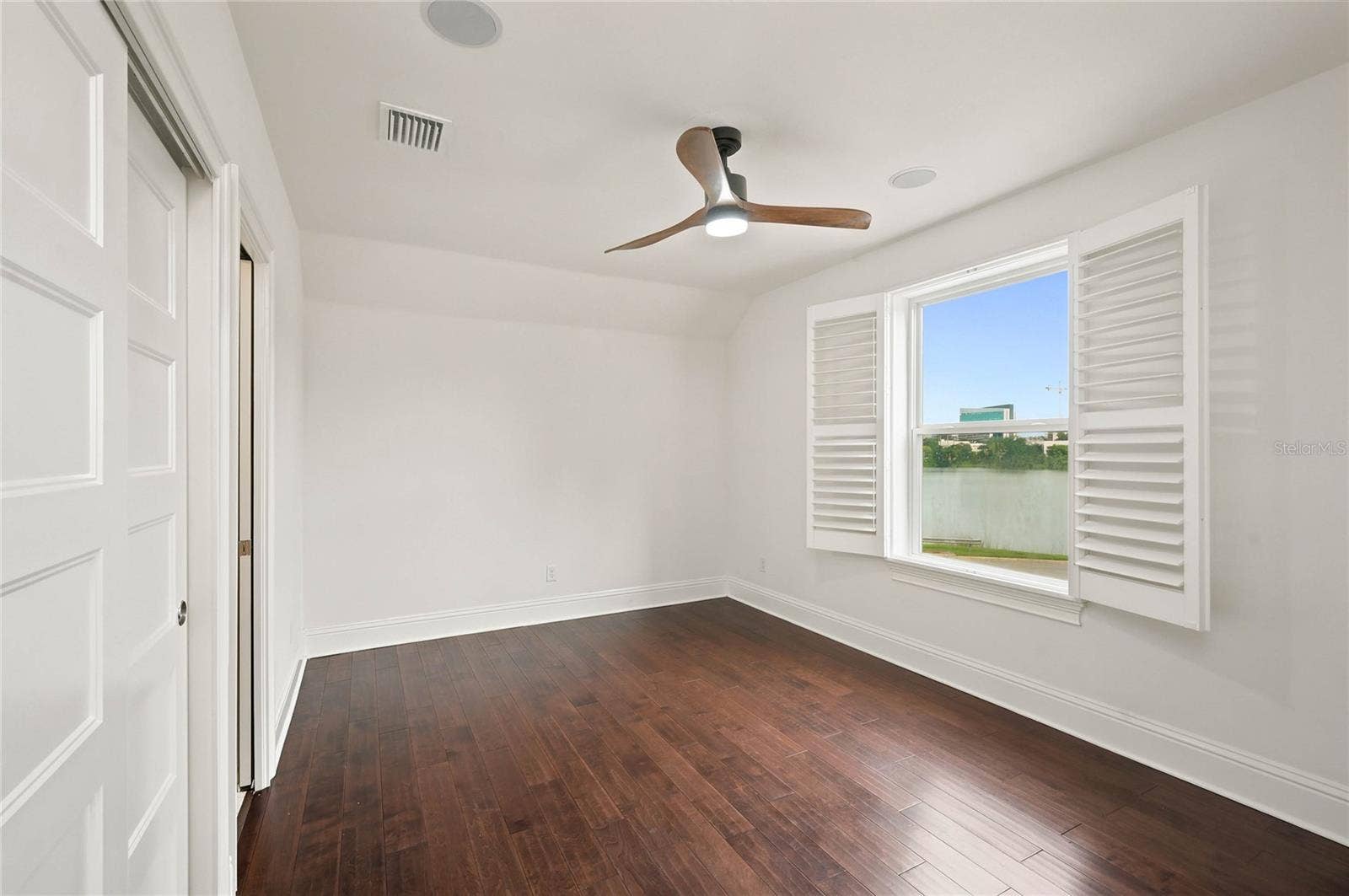 1707 ASHER LANE, Orlando, FL 32803 Bedroom 2 with window overlooking Lake Formosa