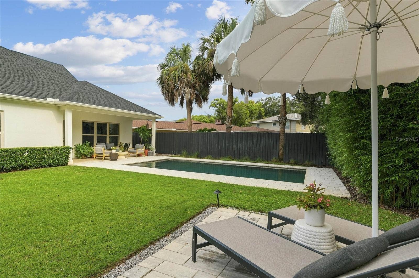 1707 ASHER LANE, Orlando, FL 32803 Back Patio to Yard
