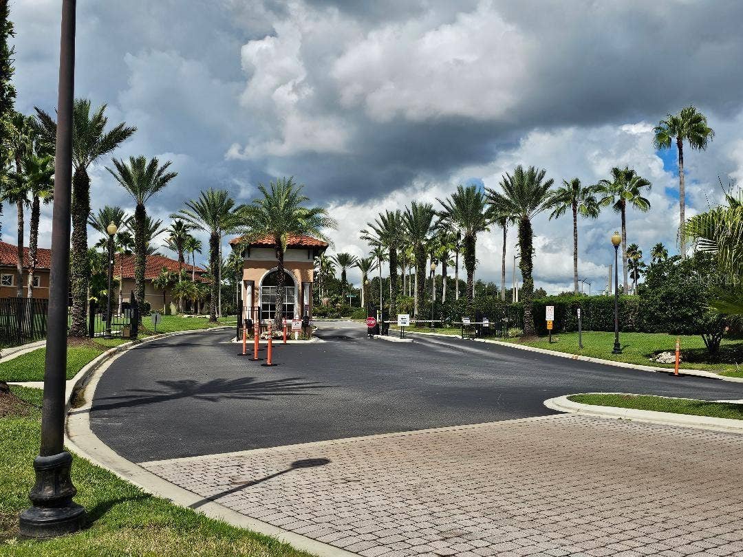 5572 METROWEST BOULEVARD, #312, Orlando, FL 32811 Security gate with guard