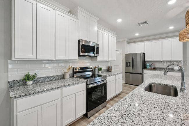 50 WOODBURY DRIVE, Palm Coast, FL 32164 Model home - actual features may vary.