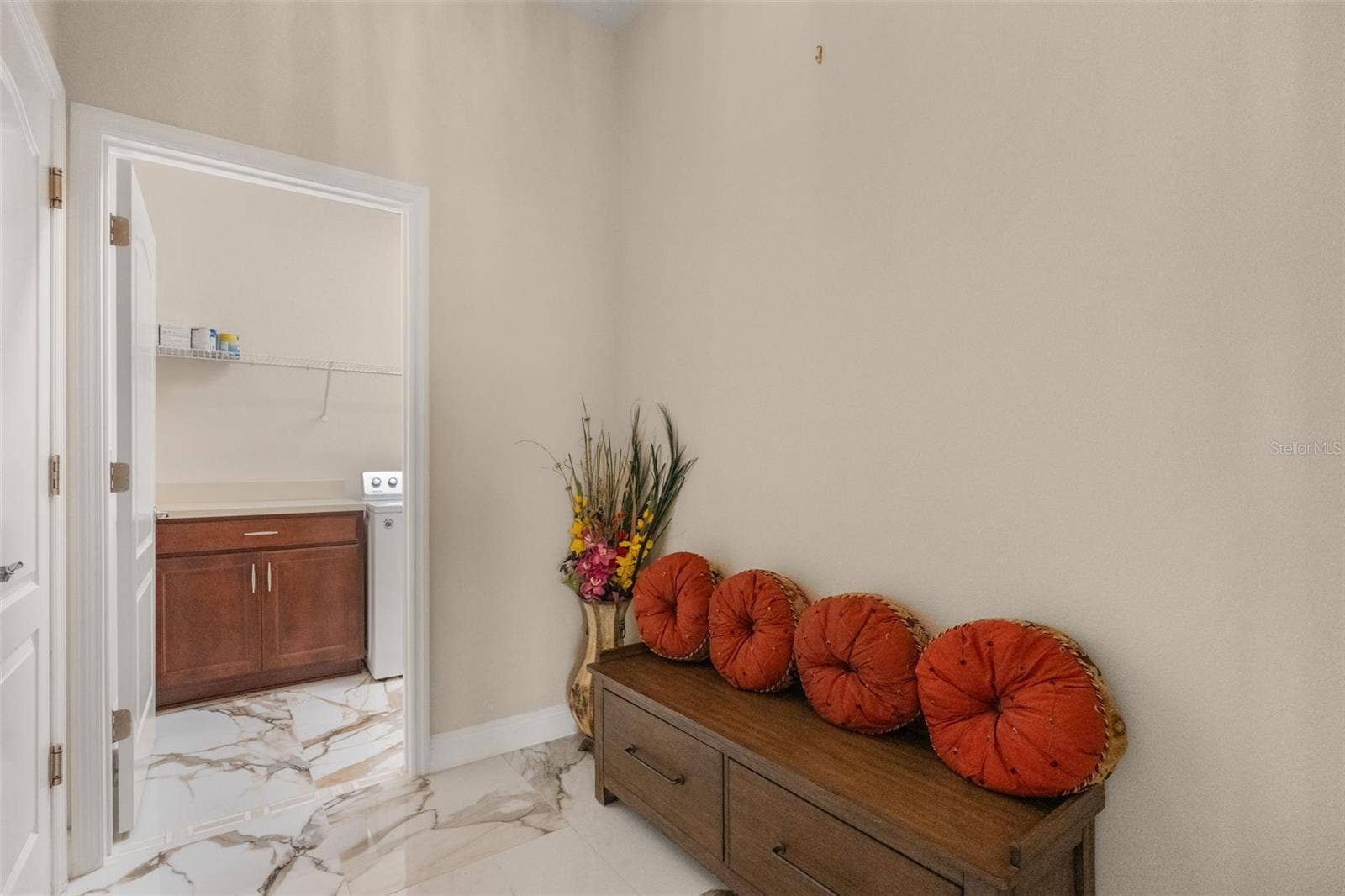 10750 PETRILLO WAY, Winter Garden, FL 34787 Hallway to laundry and garage