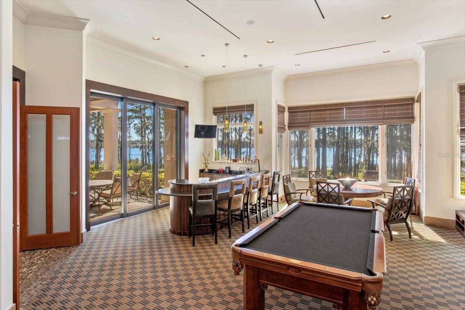 5192 VARDON DRIVE, Windermere, FL 34786 Pocket doors that fade away into the walls throughout