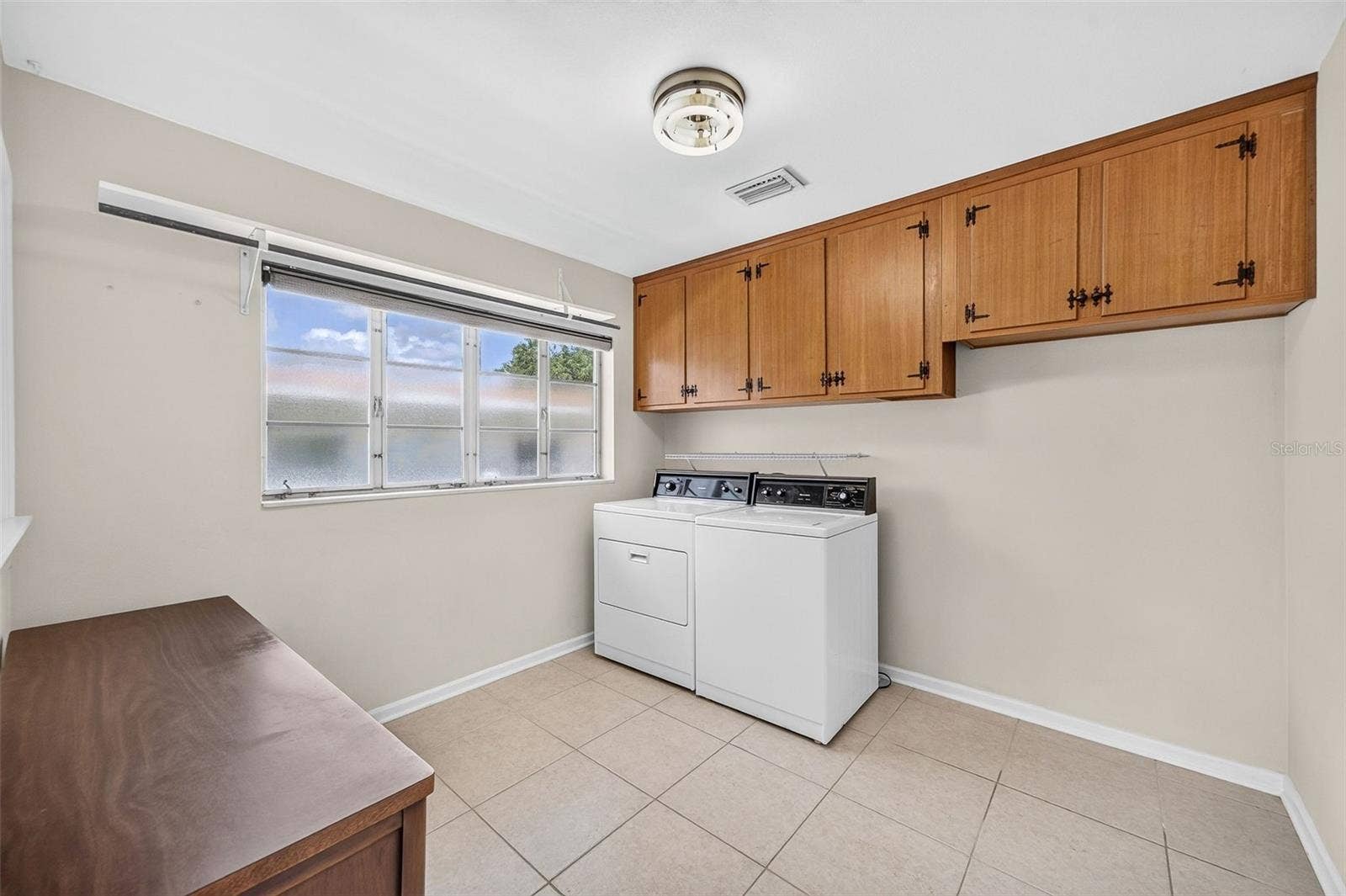 3206 ARDSLEY DRIVE, Orlando, FL 32804 Large laundry room.