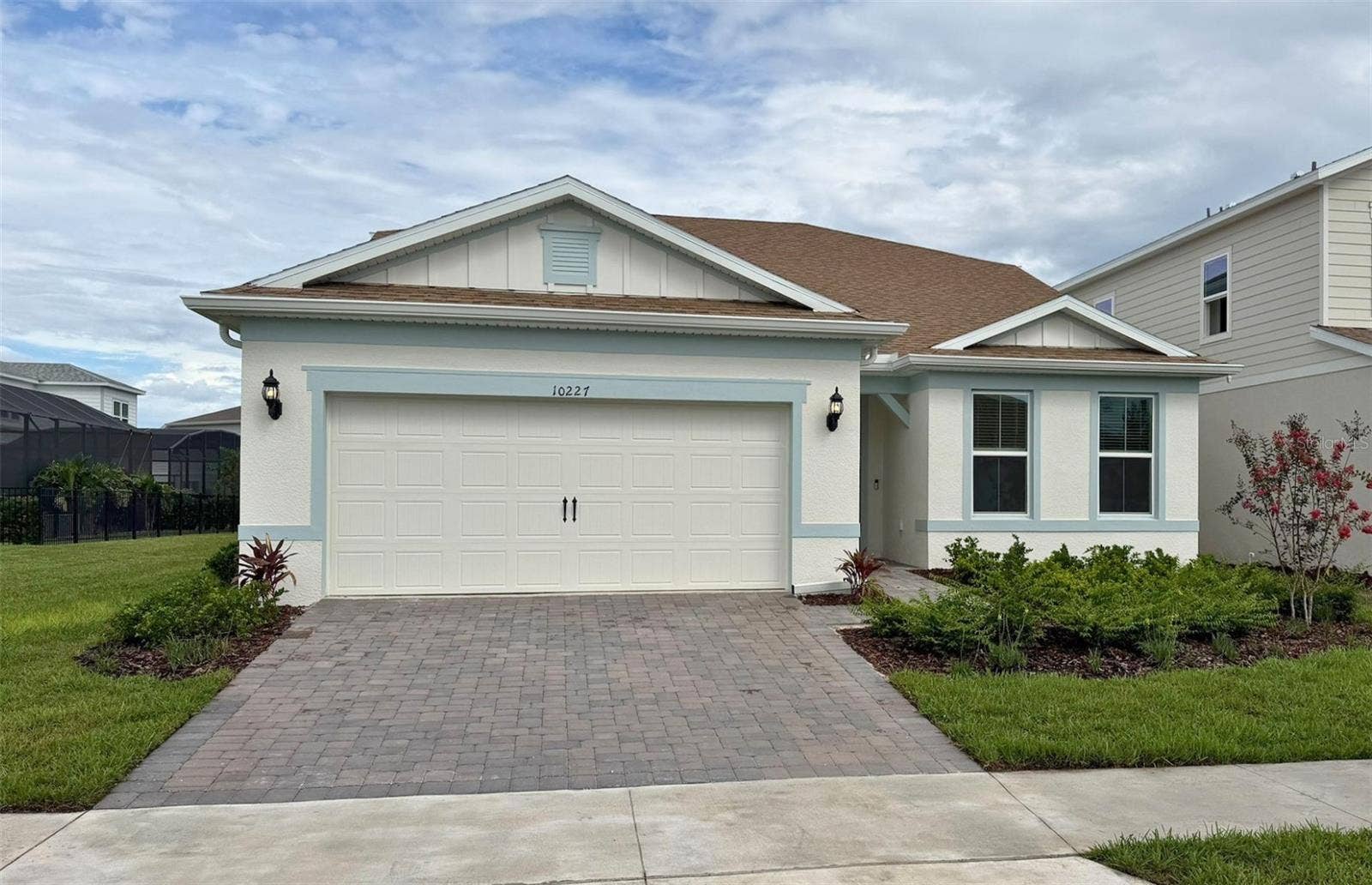 10227 PARKVIEW RESERVE LANE, Orlando, FL 32836 Actual home photo. Colors, finishes, textures and options may appear differently in person due to variations in monitors and viewing devices.