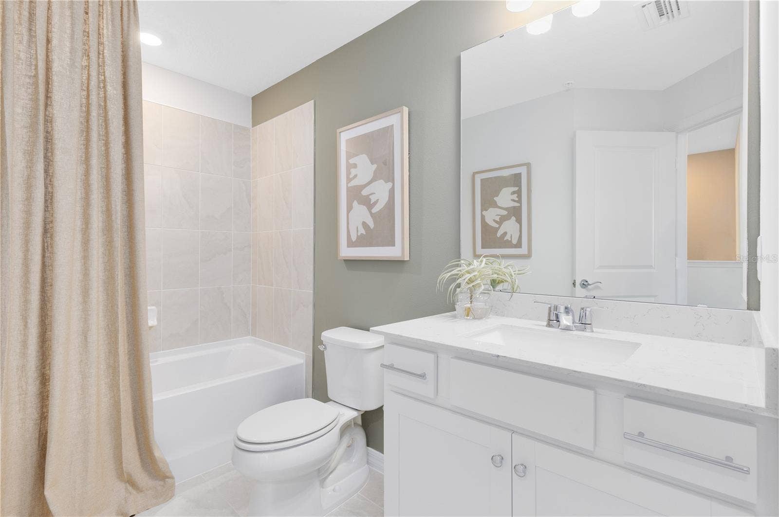 4407 JETTY LANE NE, Palm Bay, FL 32905 Model Home Design Only. Pictures and furnishings are for illustrative purposes only. Elevations, colors and options may vary. Furniture is for model home staging only.