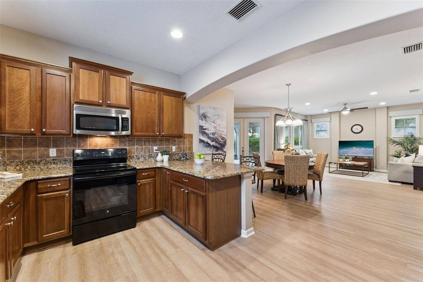 202 DRUMMOND LANE, Deland, FL 32724 View from the Kitchen to the Dining & Great Room areas