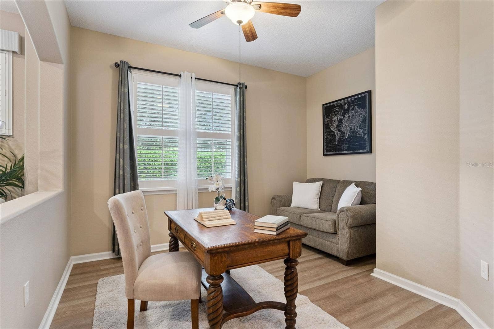 202 DRUMMOND LANE, Deland, FL 32724 11' x 12' Den/office w/ luxury vinyl flooring & a ceiling fan