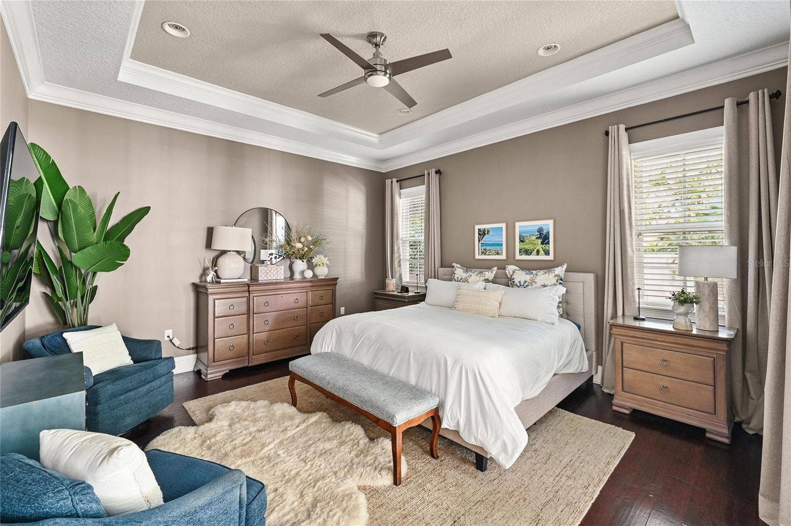 1951 WINTER PARK ROAD, Winter Park, FL 32789 The spacious primary bedroom echos the high ceilings and finishes in the main living areas.