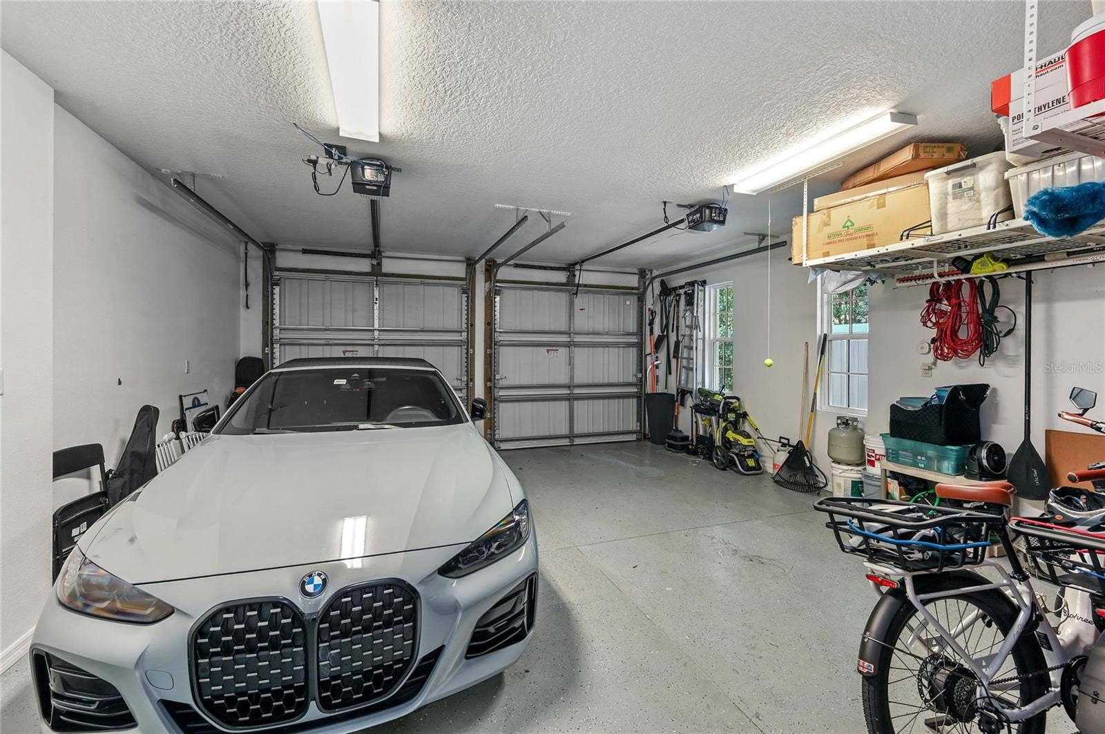 1951 WINTER PARK ROAD, Winter Park, FL 32789 The two-car garage features heavy-duty, ceiling mounted storage.