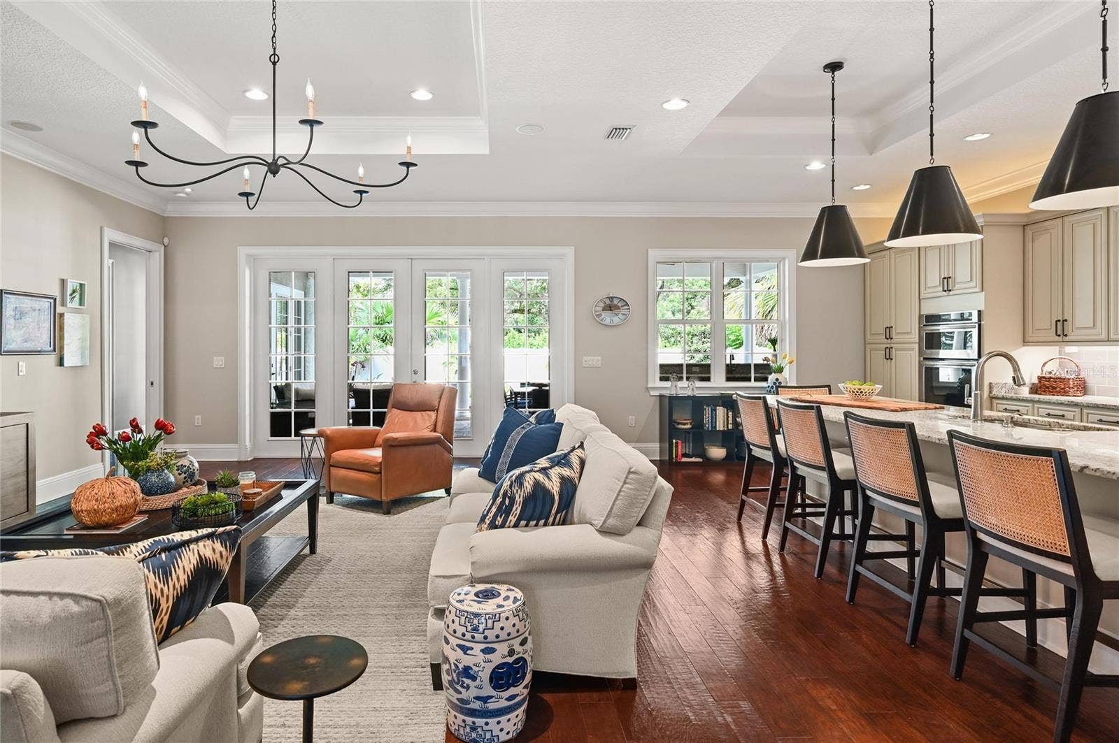 1951 WINTER PARK ROAD, Winter Park, FL 32789 The interior living area flows seamlessly to the backyard oasis, with views through expansive French doors.