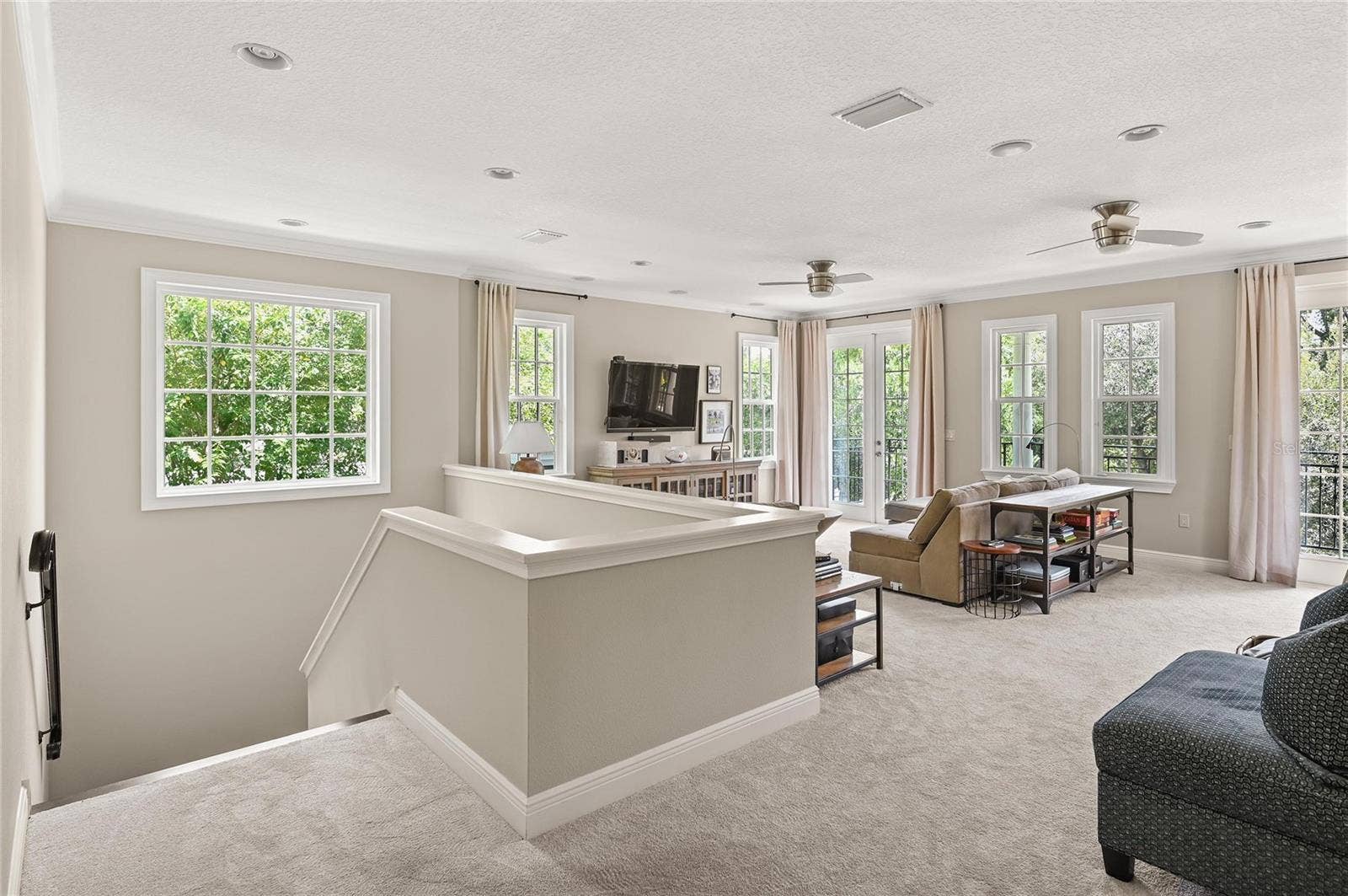 1951 WINTER PARK ROAD, Winter Park, FL 32789 The upstairs loft feels as light, bright, and open as the main living areas.