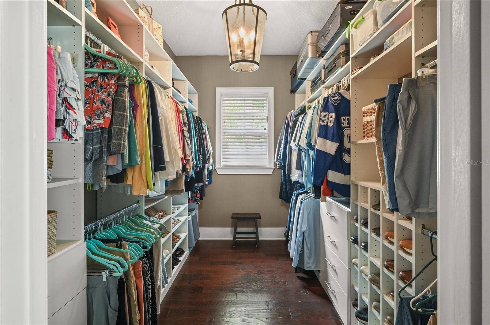 1951 WINTER PARK ROAD, Winter Park, FL 32789 Another space made large by the natural light, high ceilings, and organizers, the primary closet checks all the boxes.