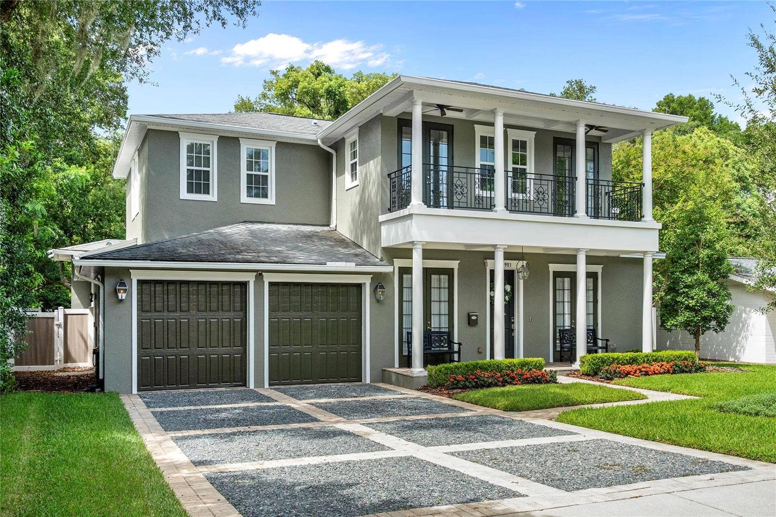 1951 WINTER PARK ROAD, Winter Park, FL 32789 The design features large porches with ceiling fans and sweeping views.