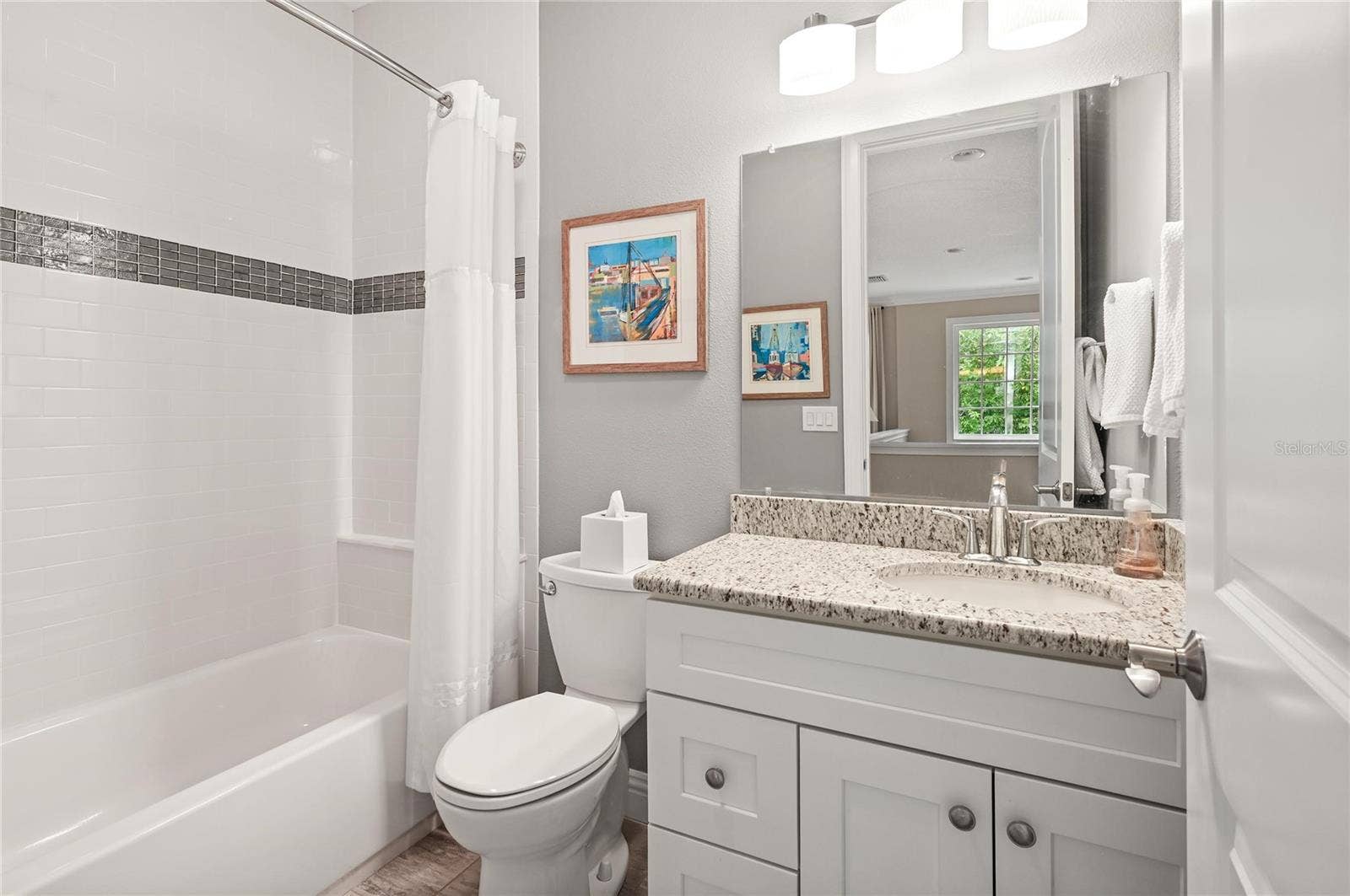 1951 WINTER PARK ROAD, Winter Park, FL 32789 This full bath is adjacent to the loft and convenient to the third upstairs bedroom.