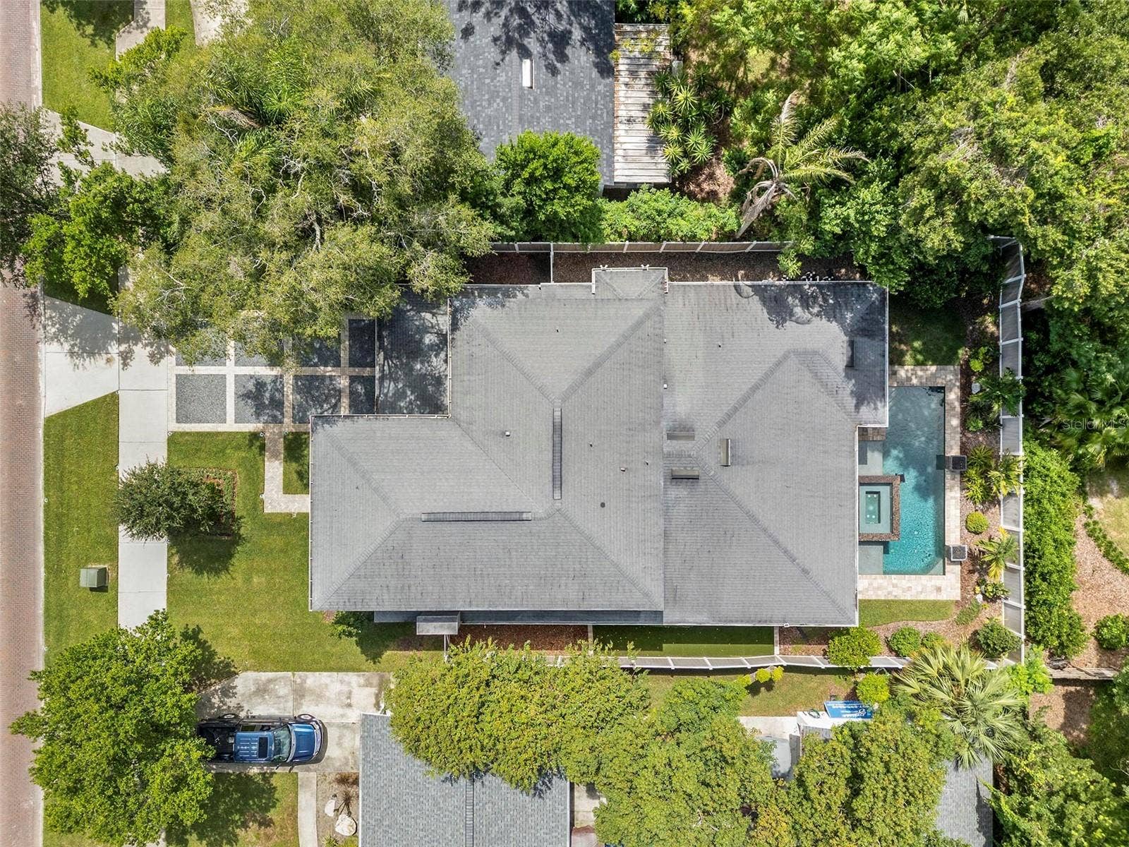 1951 WINTER PARK ROAD, Winter Park, FL 32789 The home is surrounded by lush, mature trees.
