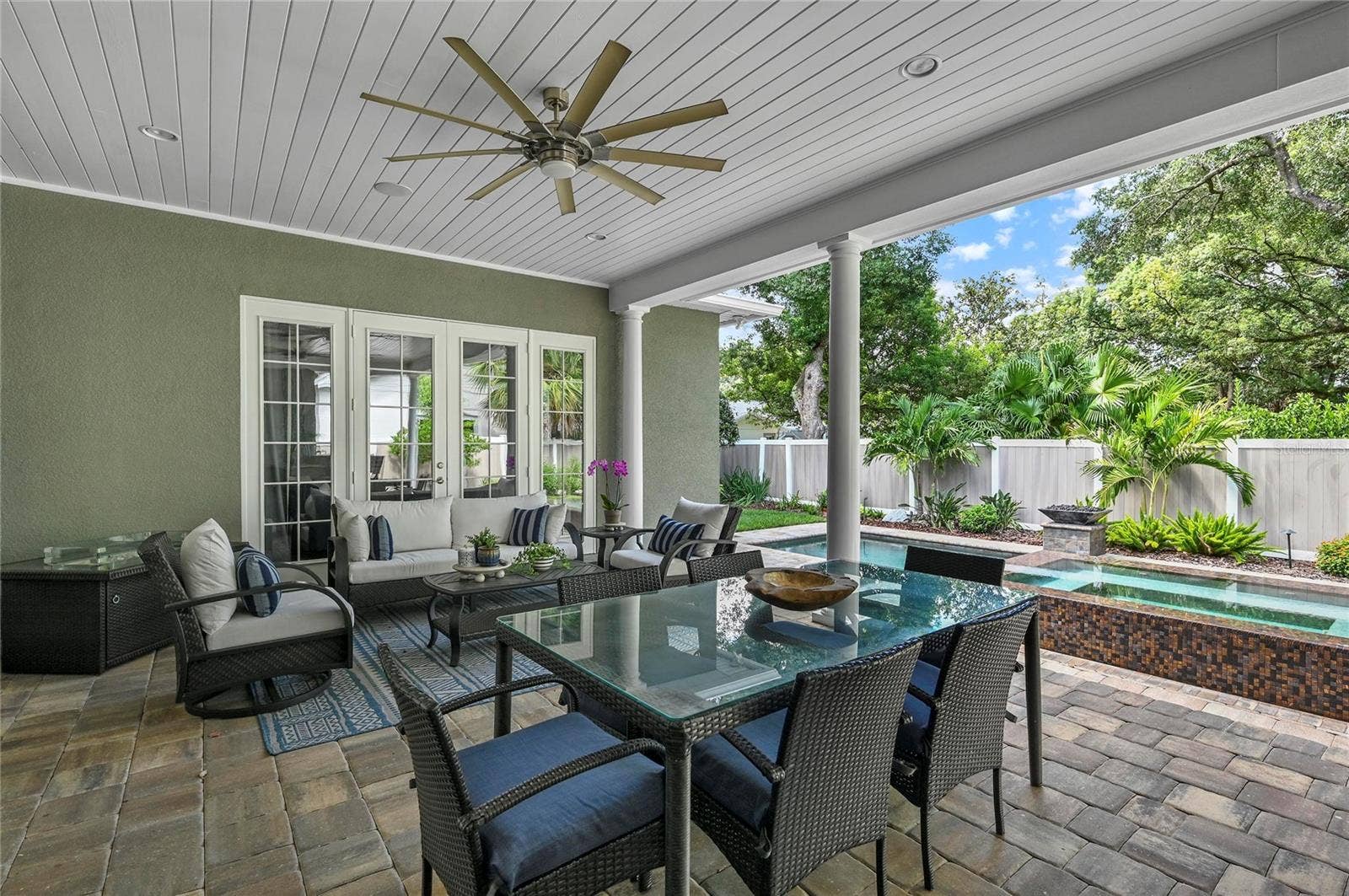 1951 WINTER PARK ROAD, Winter Park, FL 32789 Meals at the outdoor table come with a show-stopping view to the private backyard oasis.