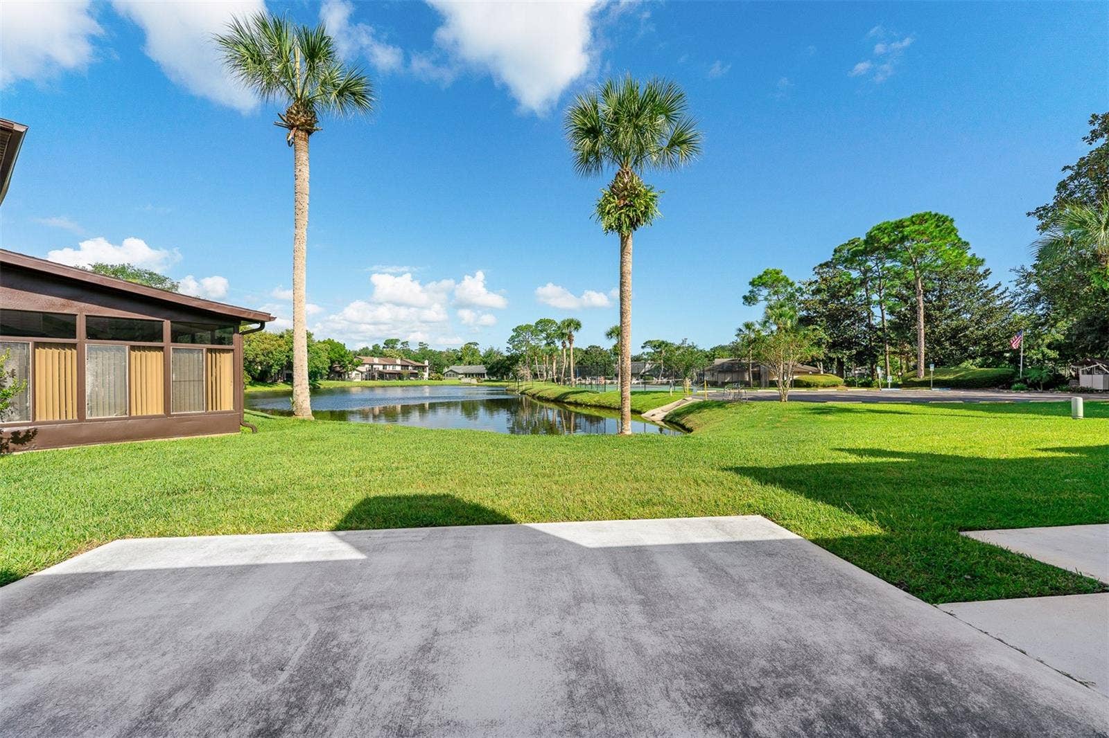 107 DEER LAKE CIRCLE, Ormond Beach, FL 32174 Back Patio and Lake View
