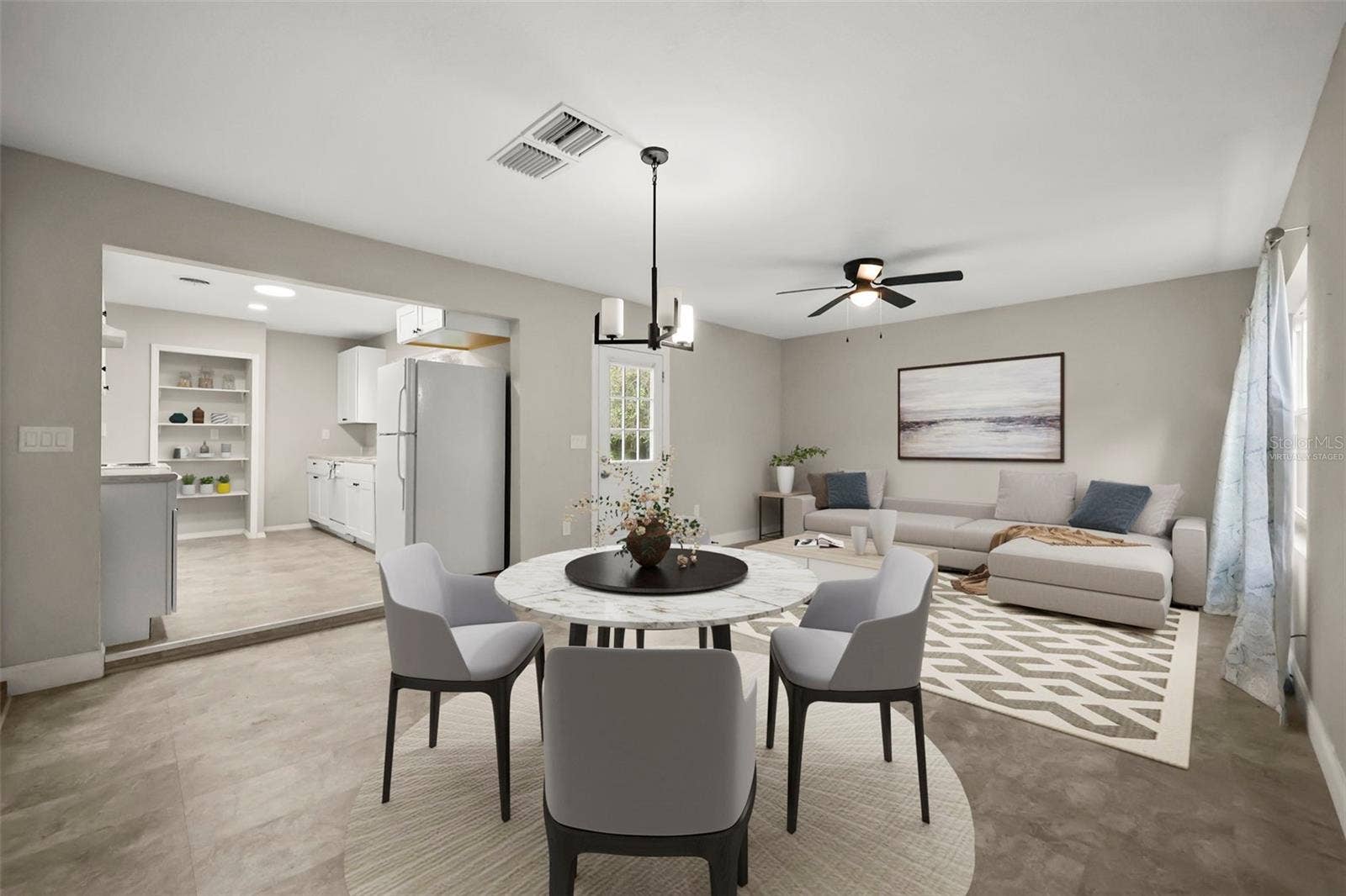 Virtually staged family room and dining room areas