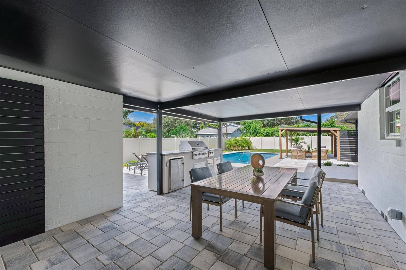 2501 NANCY STREET, Orlando, FL 32806 Covered lanai with outdoor kitchen