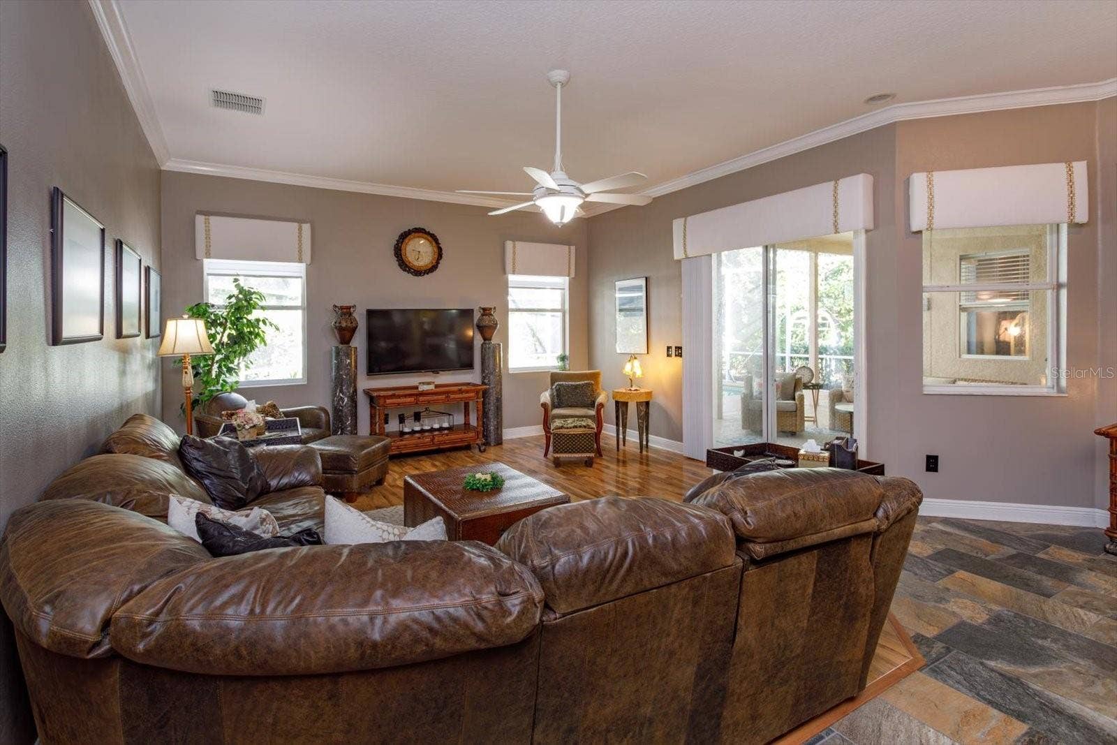 536 AVON GLADE PLACE, Sanford, FL 32771 family room views to pool and lanai