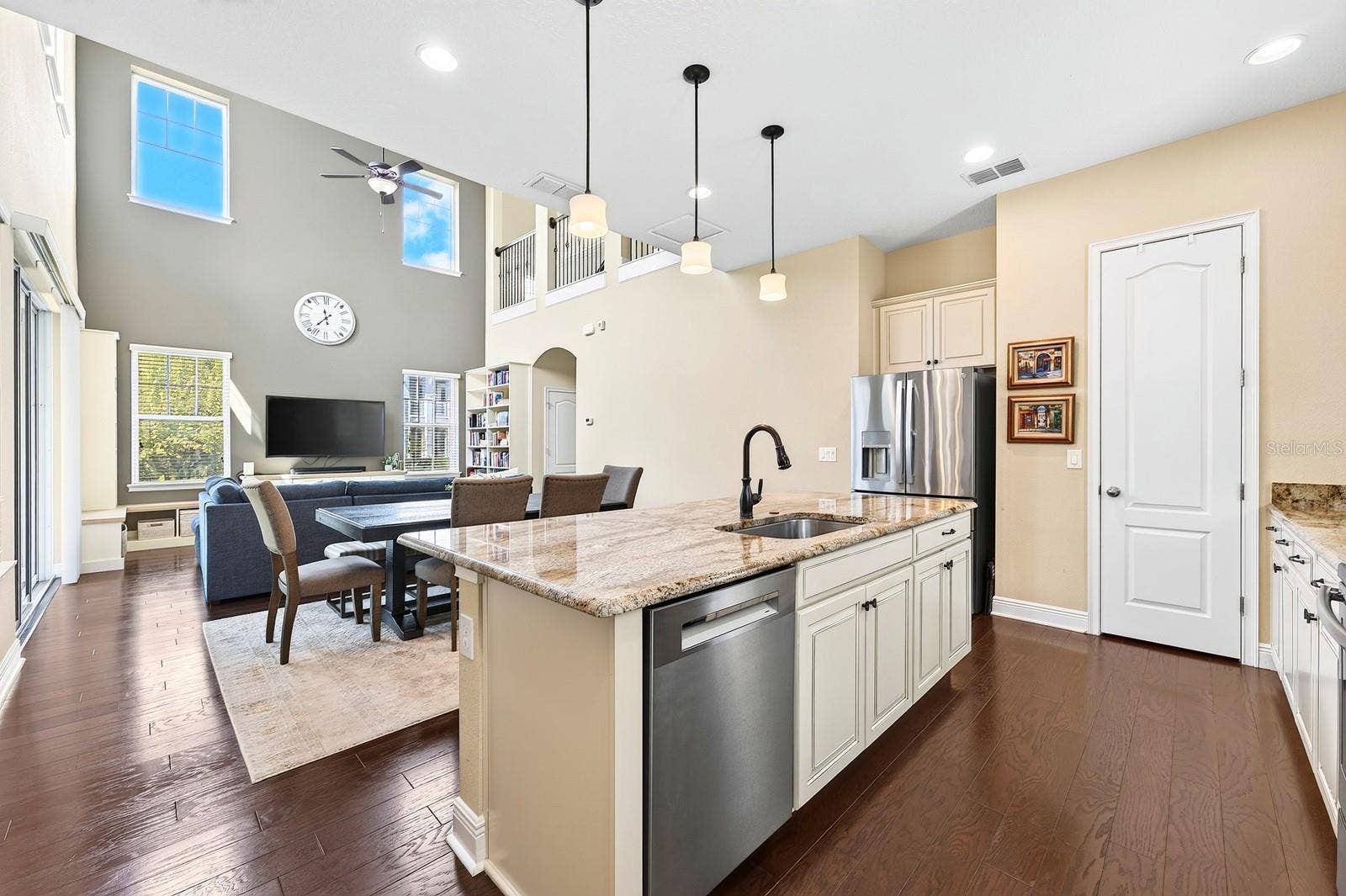 9024 NEHER STREET, Orlando, FL 32827 Kitchen is open to the living and dining areas - perfect for entertaining.