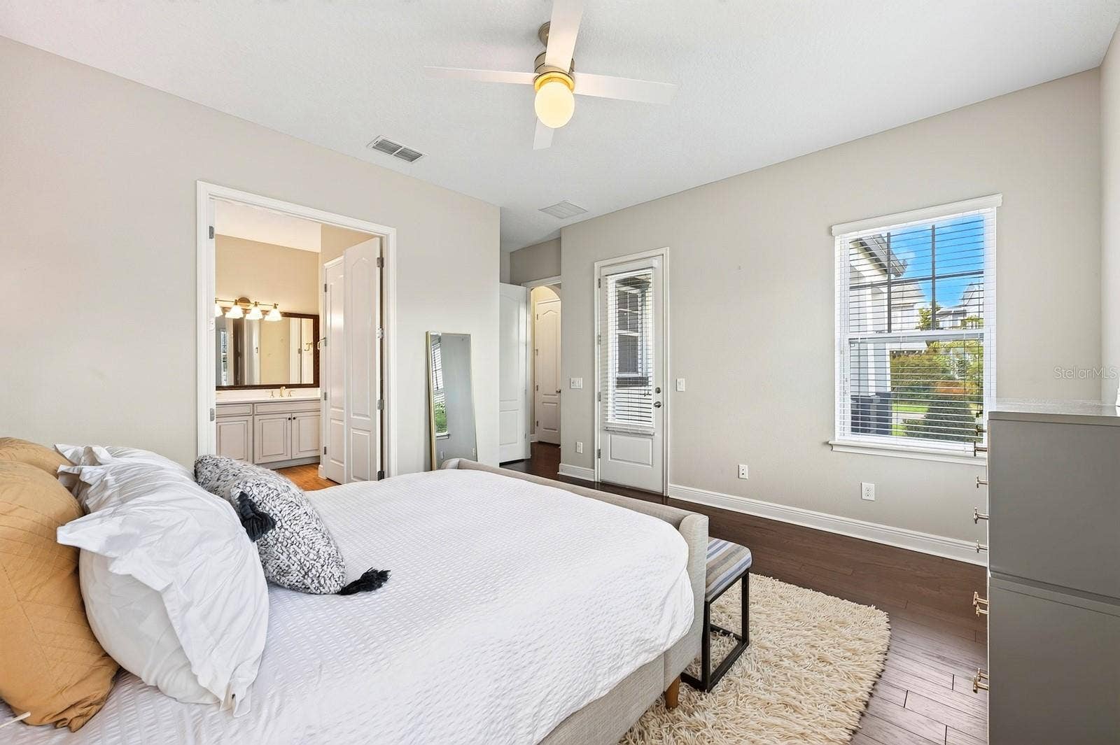 9024 NEHER STREET, Orlando, FL 32827 Light and bright main floor primary suite.