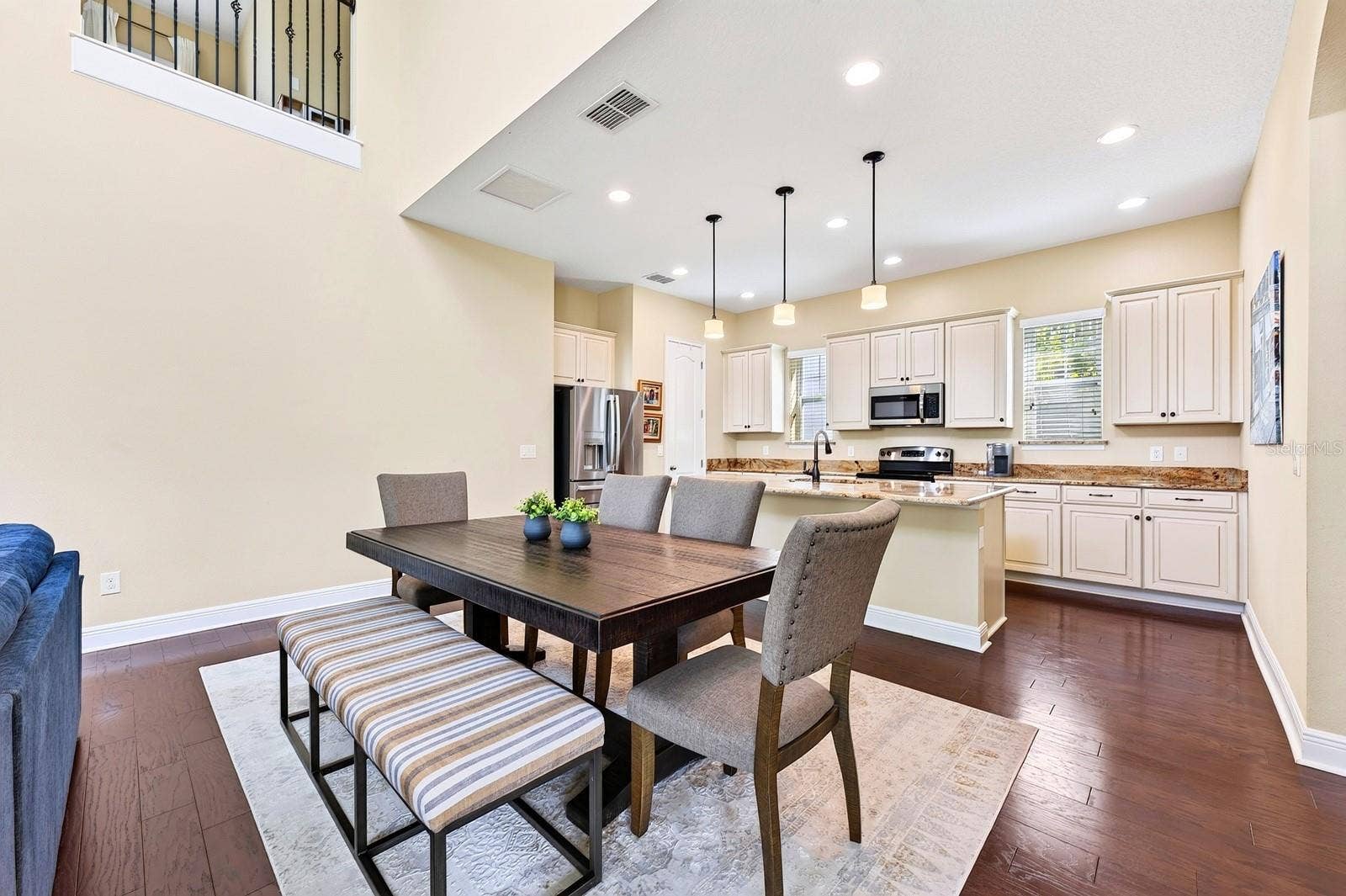 9024 NEHER STREET, Orlando, FL 32827 Dining area is open to the kitchen.
