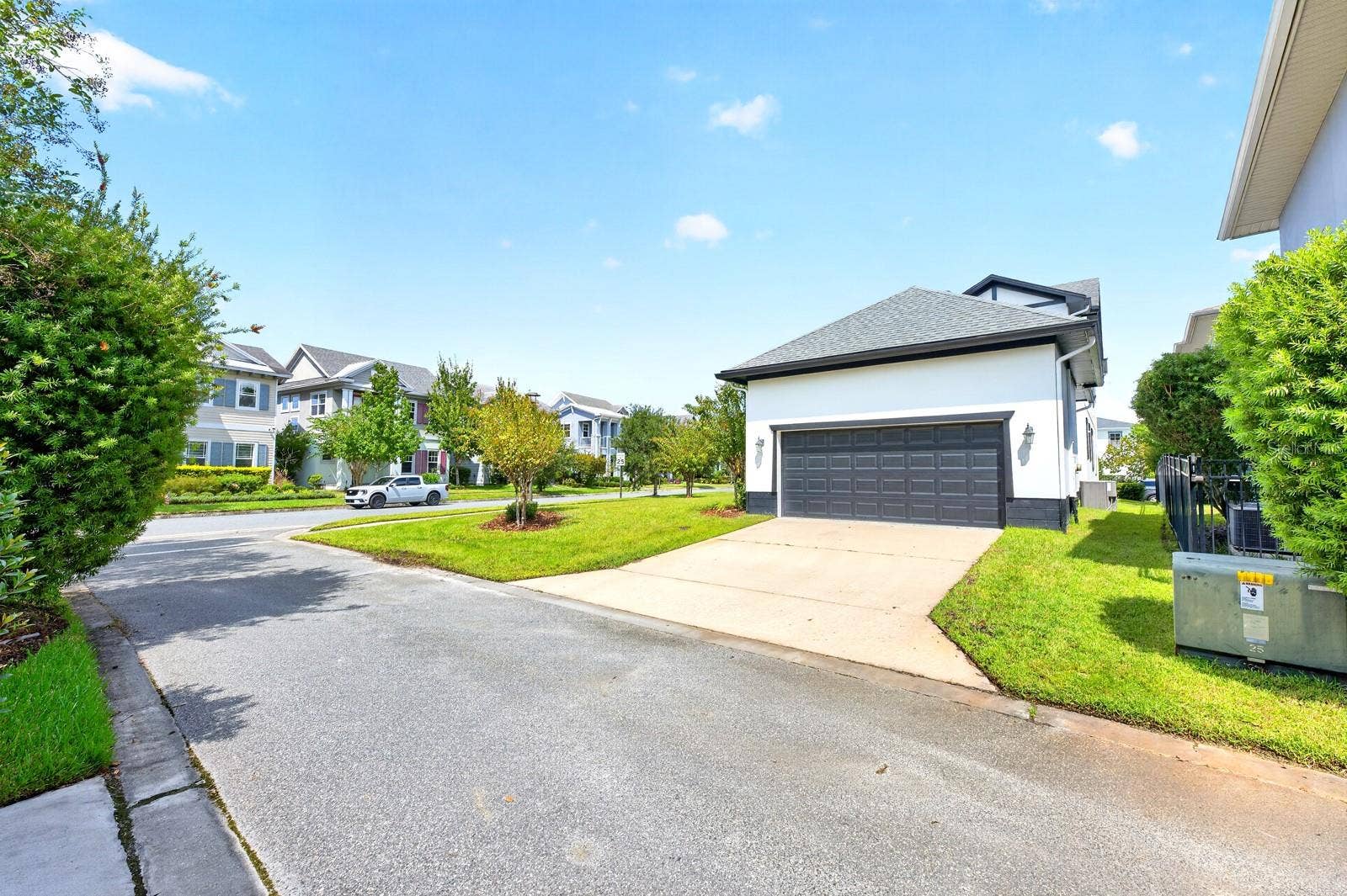 9024 NEHER STREET, Orlando, FL 32827 2-car rear facing garage.